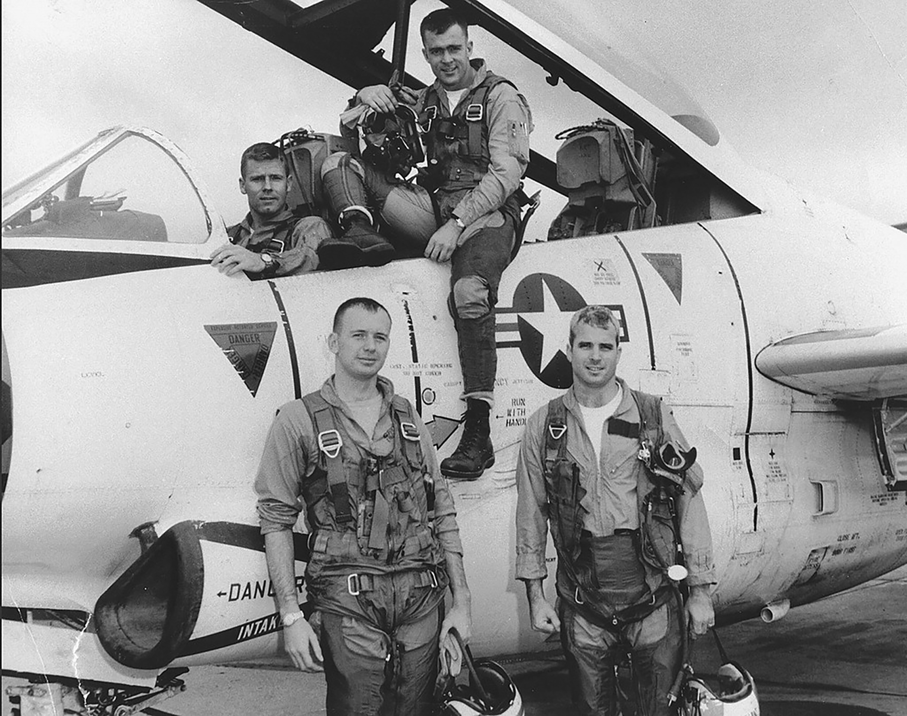 John McCain, (front, right) with his squadron in 1965. (Library of Congress/AP)