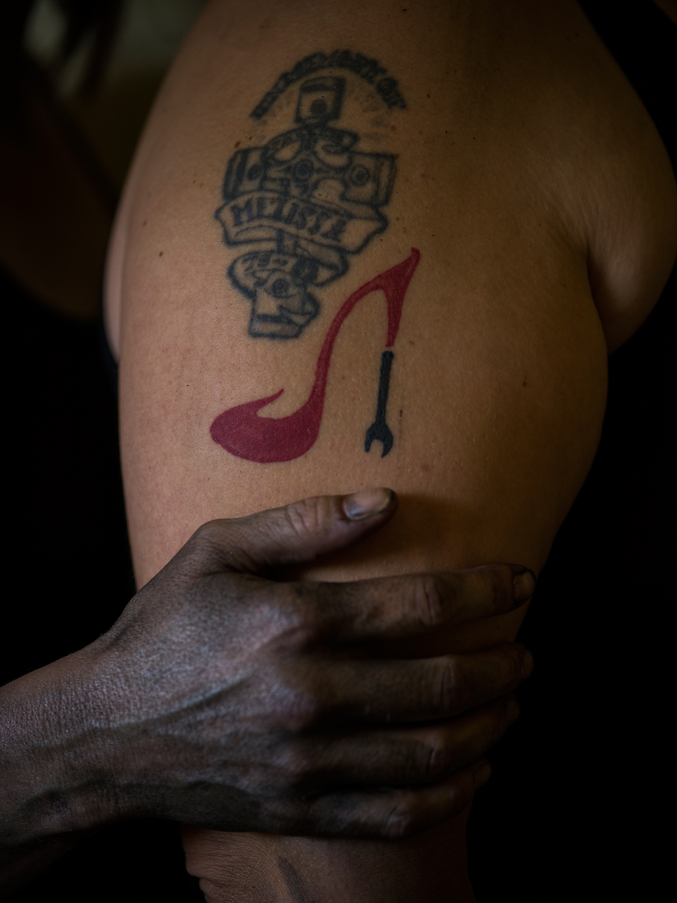 Sweeney and Banks each sport a tattoo of the Girls Auto Clinic logo. (Michal Chelbin for TIME)