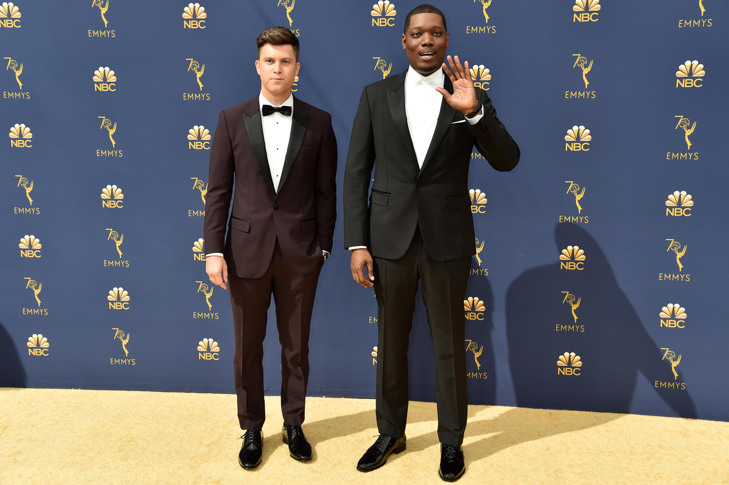 Hosts Colin Jost and Michael Che arrive at the 70th Emmy Awards on Sept. 17.