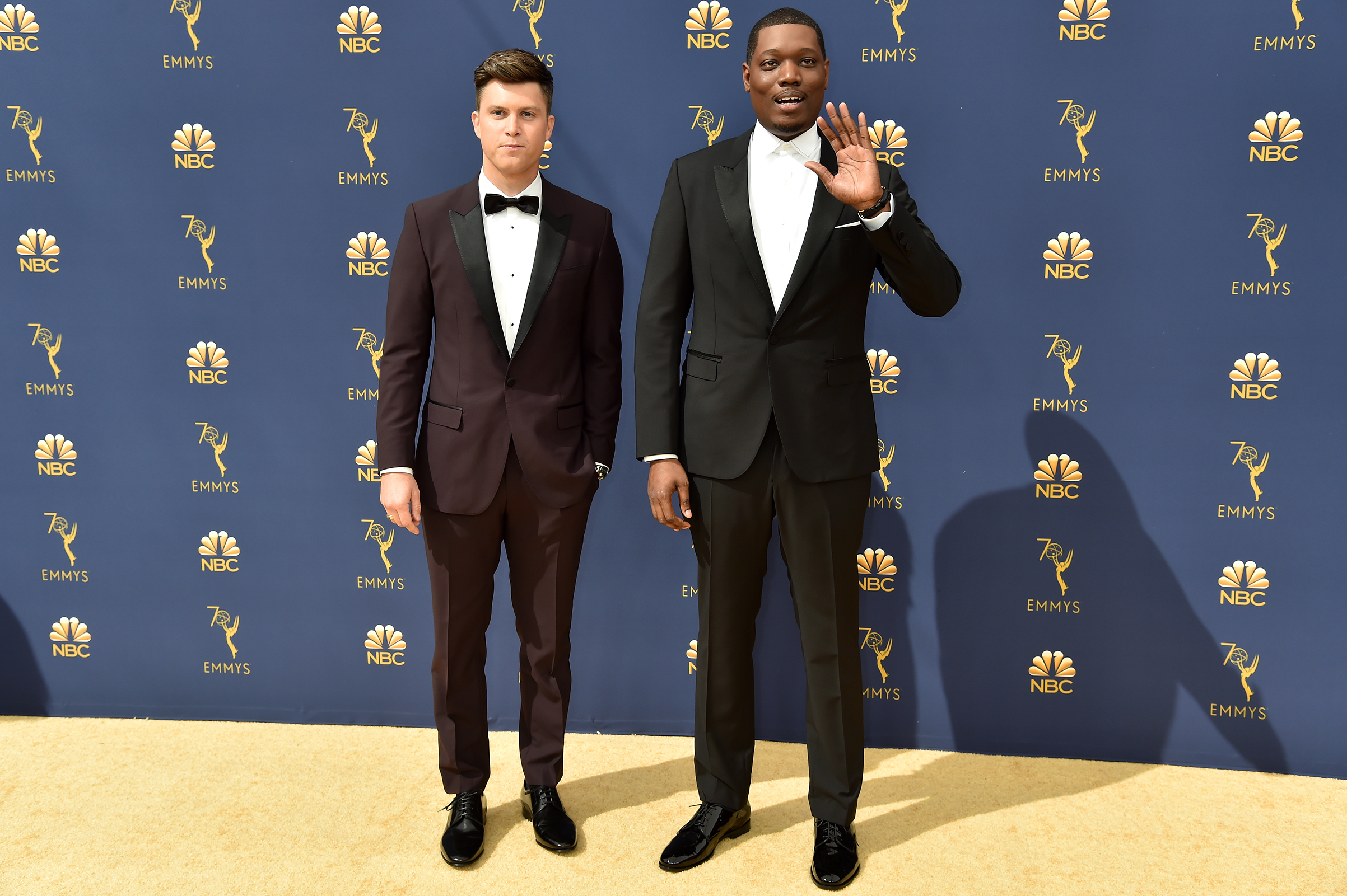 Hosts Colin Jost and Michael Che arrive at the 70th Emmy Awards on Sept. 17. (Jeff Kravitz—FilmMagic/Getty Images)