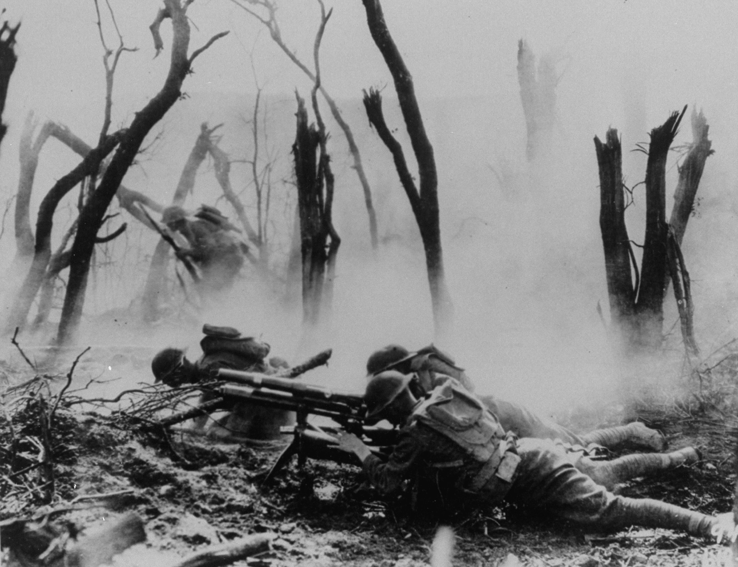U.S. soldiers of the 23rd Infantry, 2nd Division, firing a 37mm machine gun at a German position in the Argonne Forest, during the Meuse-Argonne offensive in 1918.