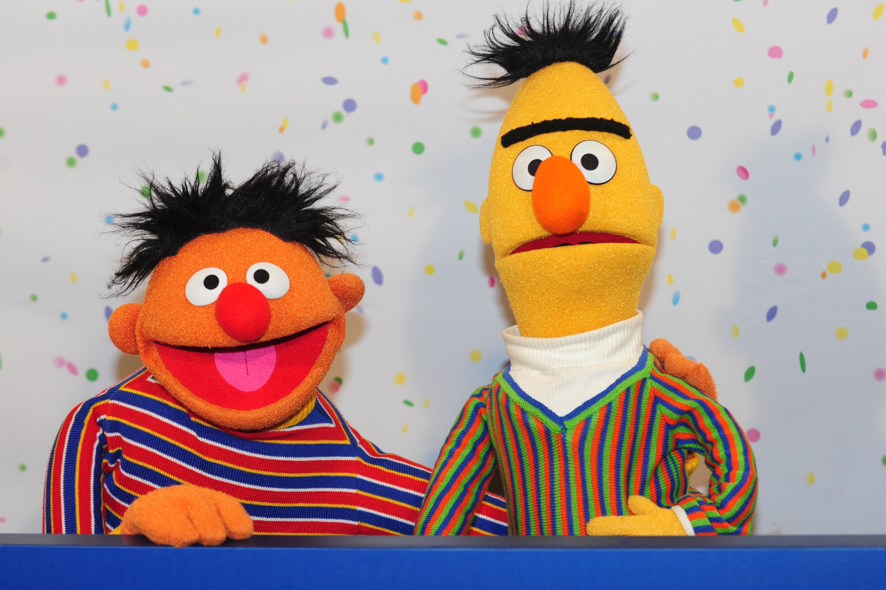 Sesame Street Muppets Ernie and Bert pose for photographs during a press conference on the 40th anniversary of the Sesame Street in Hamburg, Germany, 07 January 2013. (Getty Images)