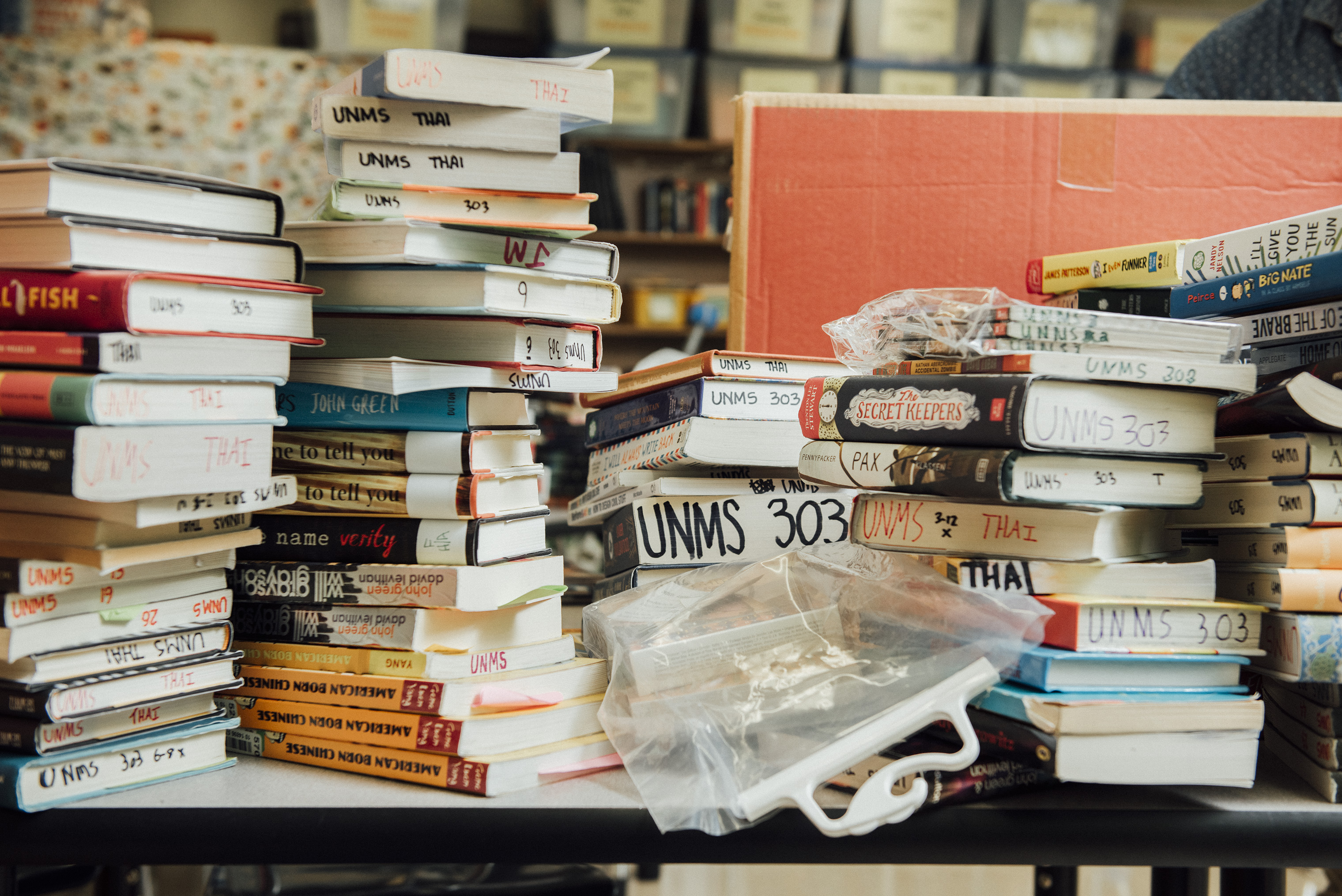 Stacks of books are organized in Binh Thai's classroom at the University Neighborhood Middle School in New York City. (George Etheredge for TIME)