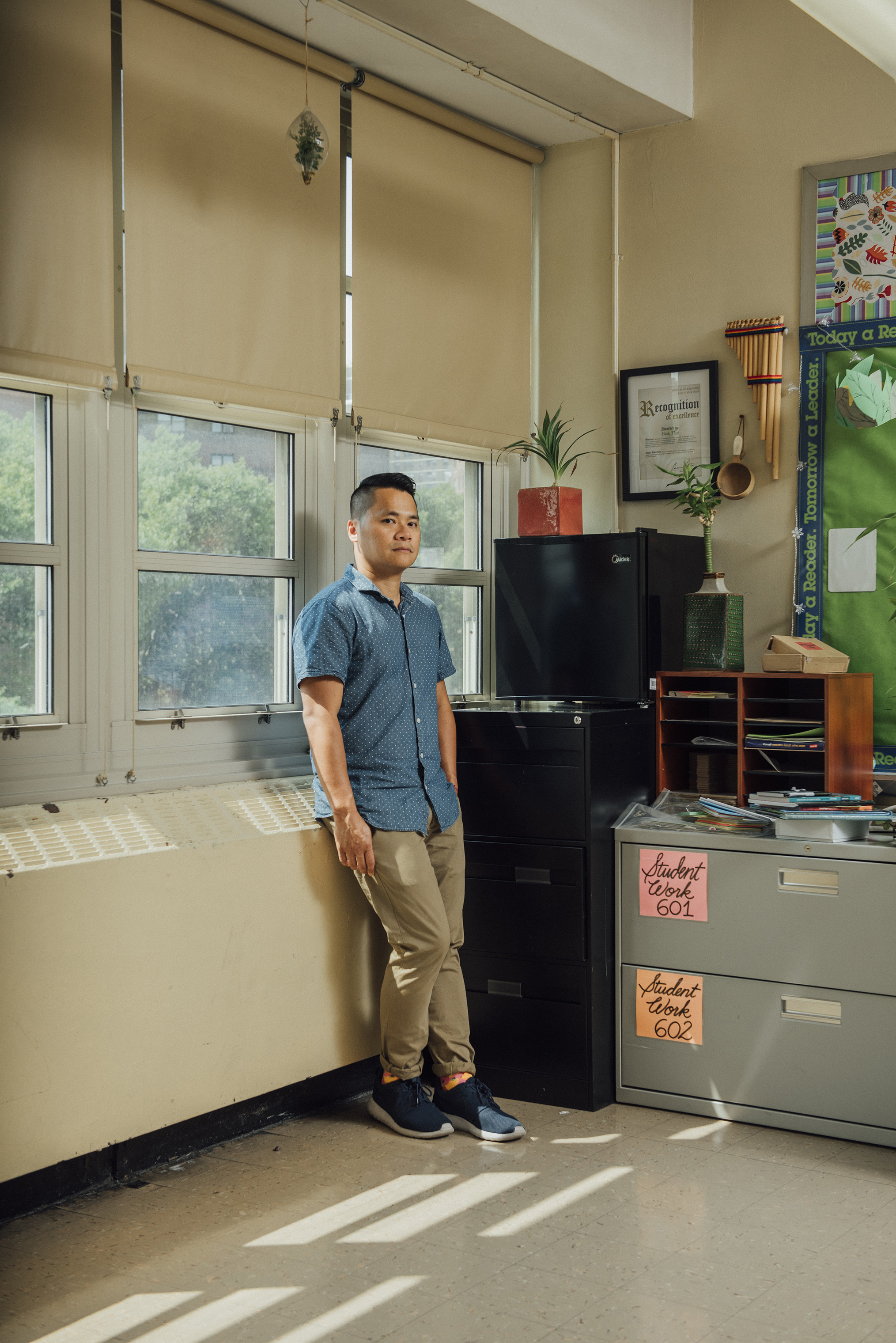 Humanities teacher Binh Thai in his classroom at University Neighborhood Middle School in New York City on Aug. 16. (George Etheredge for TIME)