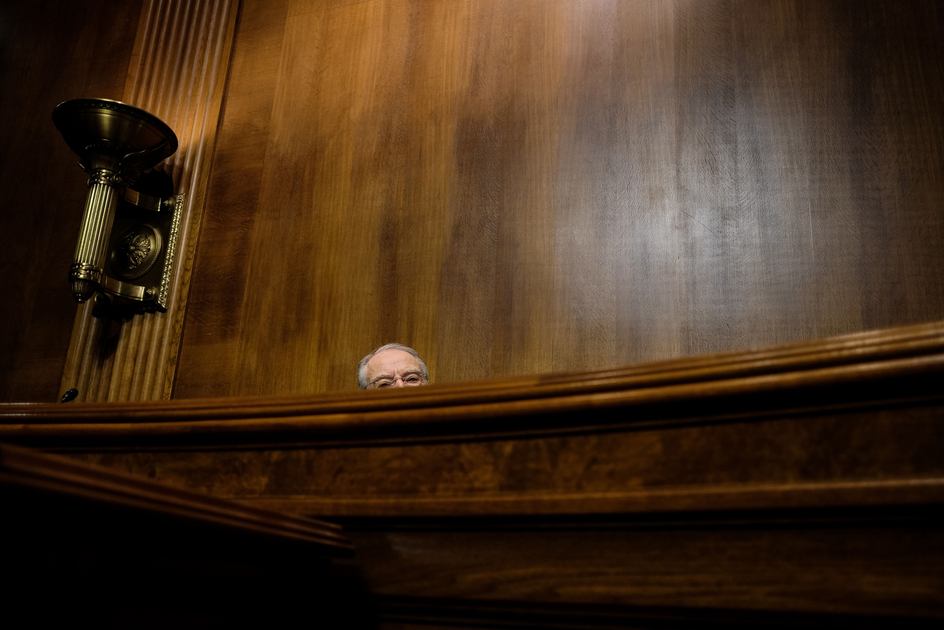 Sen. Charles E. Grassley, chairman, is seen as the Senate Judiciary Committee holds a hearing for Christine Blasey Ford on Sept. 27. (Gabriella Demczuk—The New York Times/Pool/AFP/Getty Images)