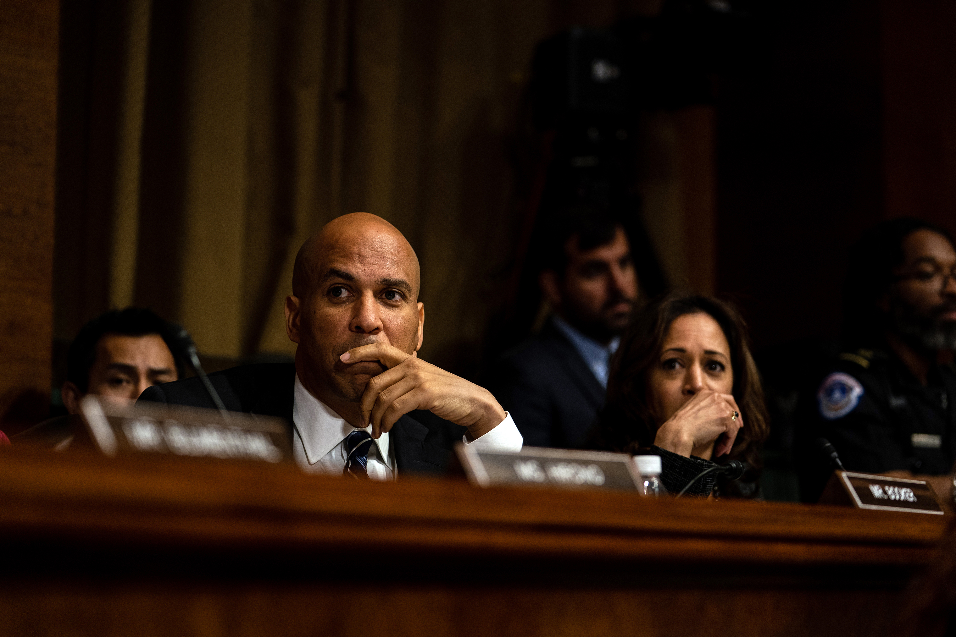 Sens. Cory Booker (D-NJ) and Kamala Harris (D-CA) listen during testimony on Sept. 27. (Erin Schaff—The New York Times/Pool/Getty Images)