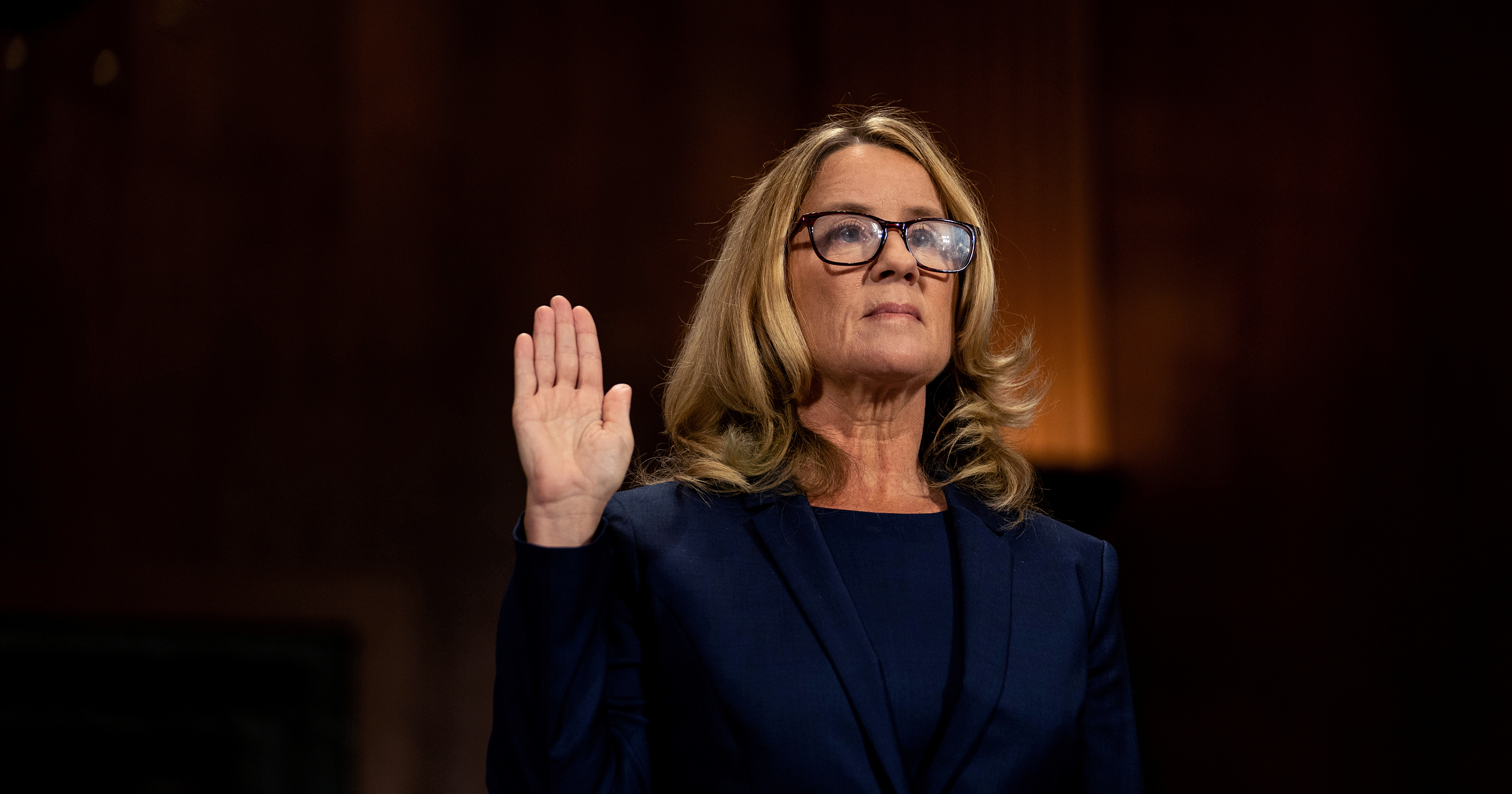 Christine Blasey Ford swears in at a Senate Judiciary Committee hearing for her to testify about sexual assault allegations against Supreme Court nominee Judge Brett Kavanaugh on Capitol Hill in Washington on Sept. 27. (Erin Schaff for The New York Times/Pool/Reuters)