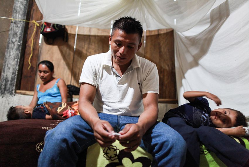 David Xol, his wife Florinda Bol and two of their sons at their home in San Miguel Limón. Xol made his way across Mexico with his third son, eight-year-old Byron. Xol was deported back to Guatemala; Byron remains in a shelter in Baytown.  Carlos Sebastián/Nómada
