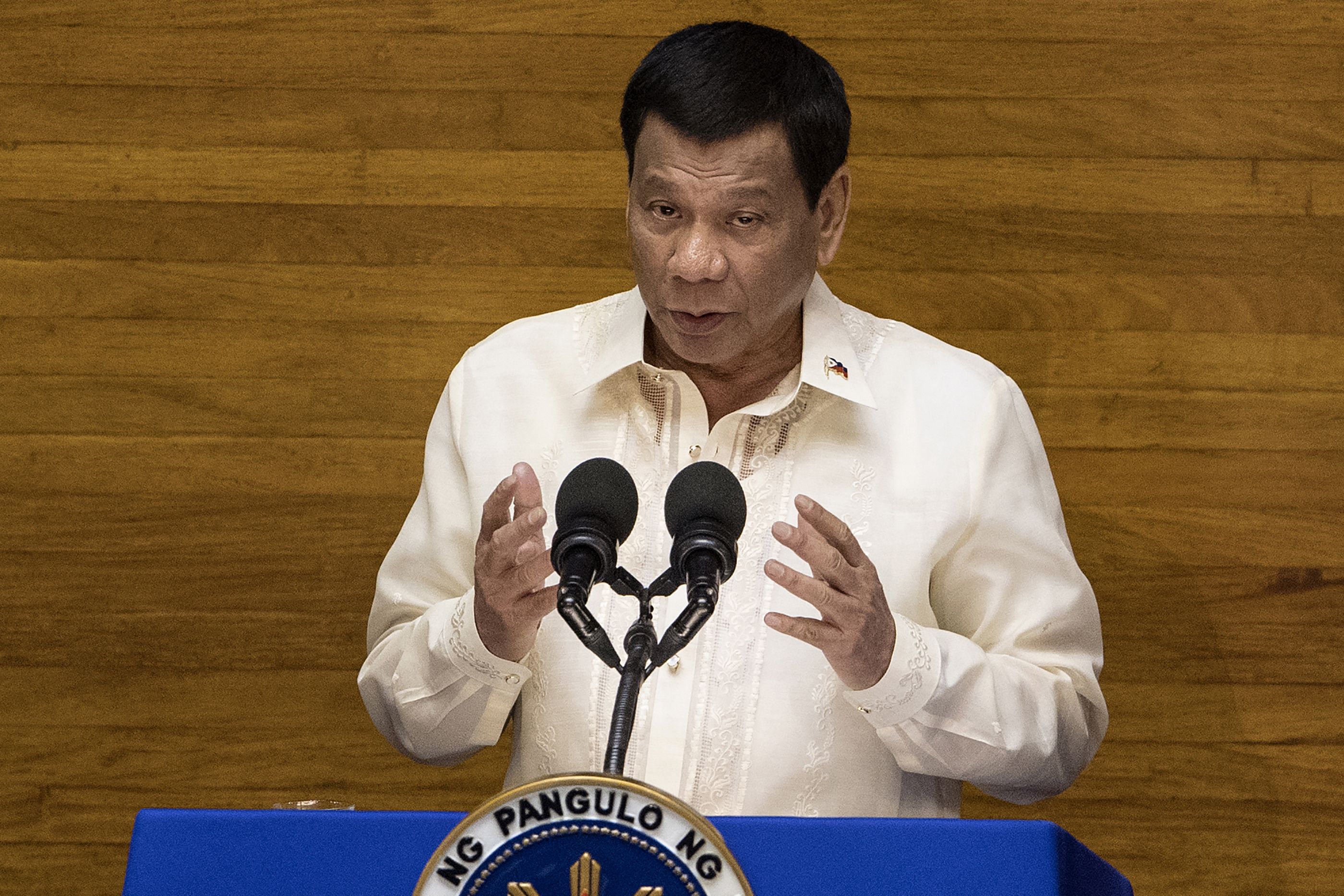 Philippine President Rodrigo Duterte gestures as he delivers his state of the nation address at Congress in Manila on July 23, 2018. (Noel Celis—AFP/Getty Images)
