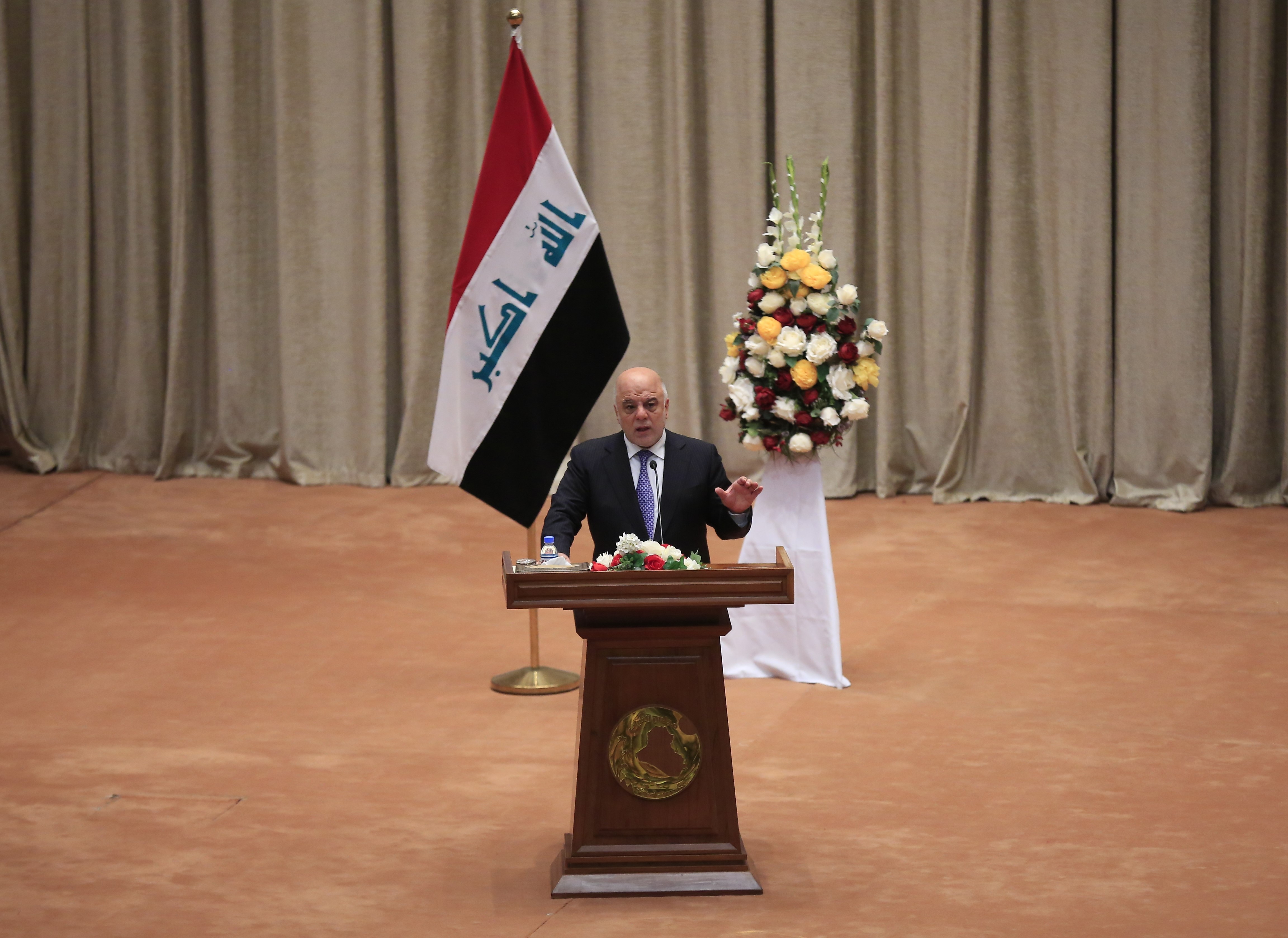 Iraqi Prime Minister Haider al-Abadi delivers a speech during the opening session of New Iraqi parliament at the Parliament Building on Sept. 3, 2018 in Baghdad, Iraq (Anadolu Agency—Getty Images)