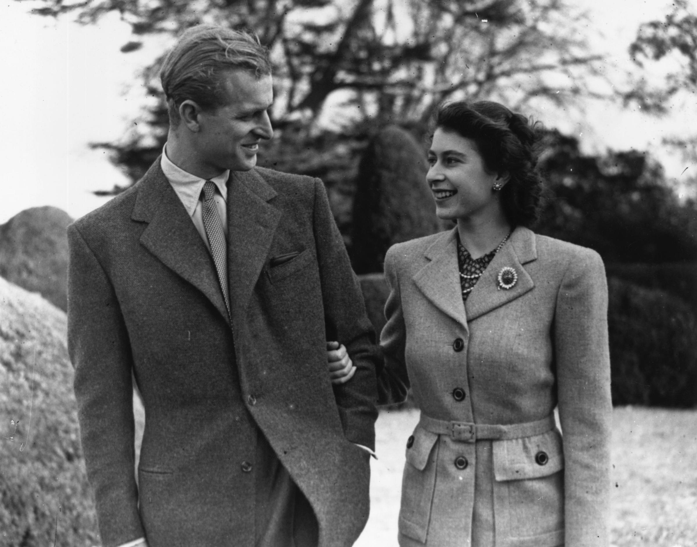 Princess Elizabeth and Prince Philip walk during their honeymoon at Broadlands, Romsey, Hampshire, Nov. 24, 1947.