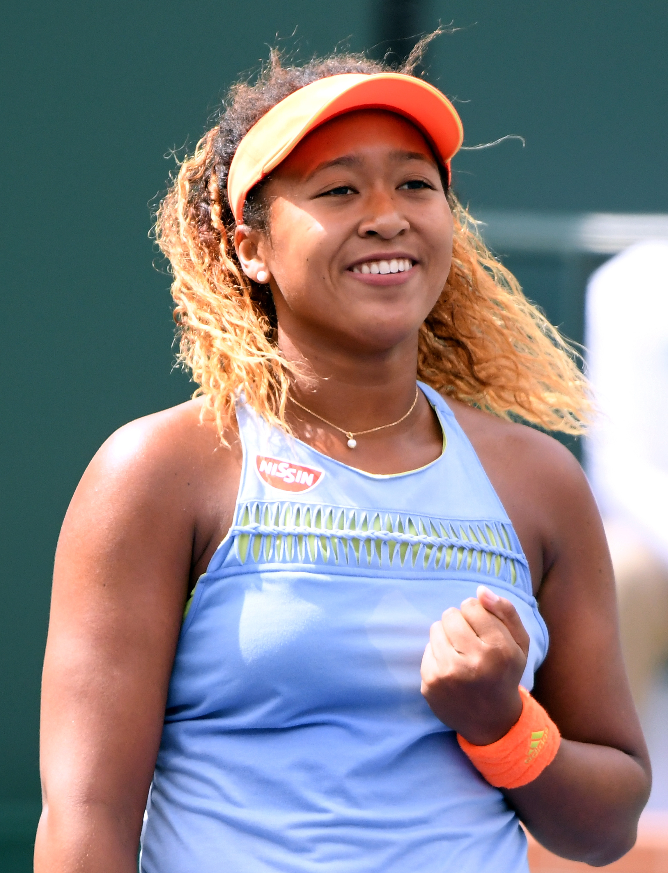 Naomi Osaka of Japan celebrates a match point in the WTA final over Daria Kasatkina of Russia during the BNP Paribas Open on March 18, 2018 in Indian Wells, California. (Harry How—Getty Images)