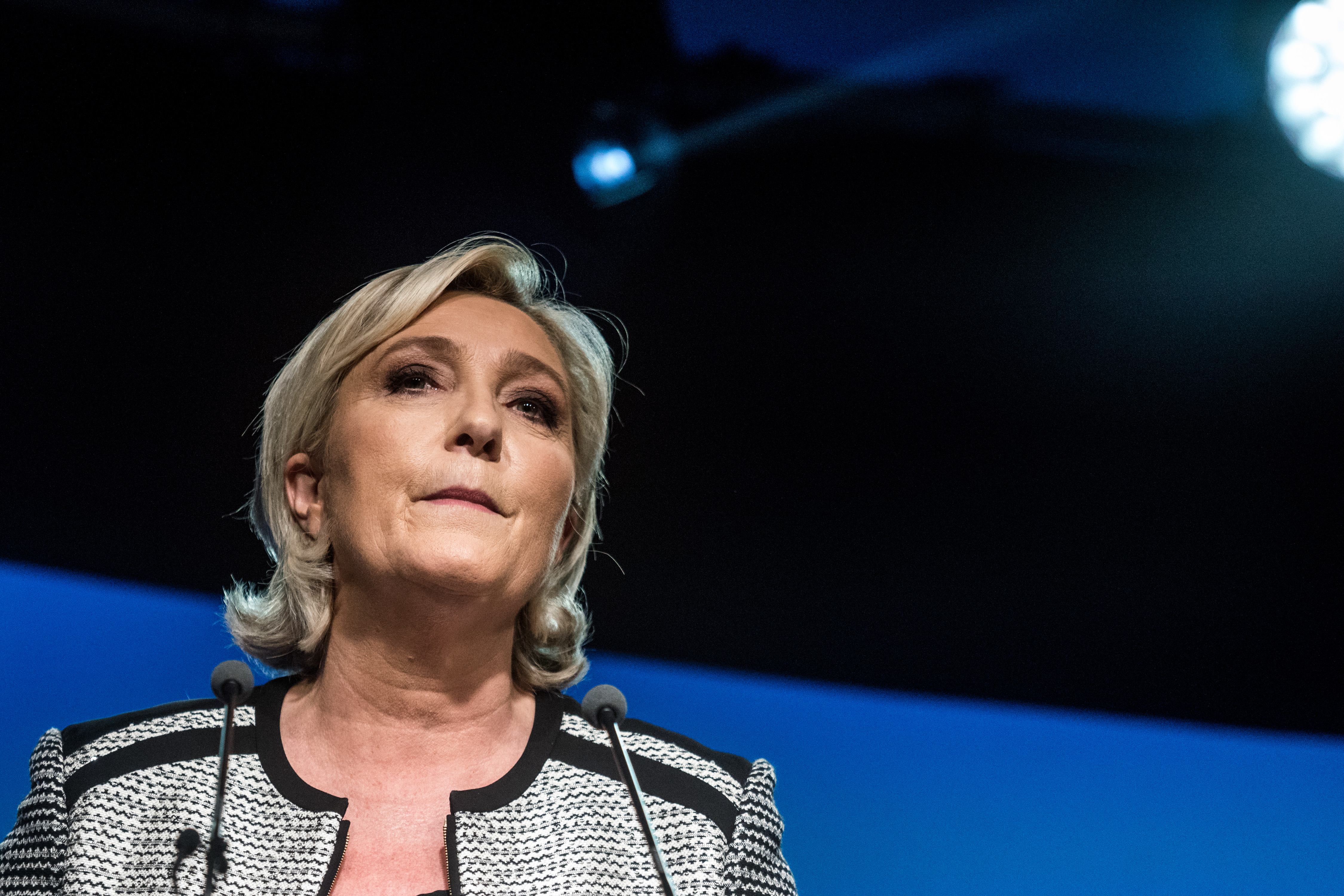 Head of a French far-right party Marine Le Pen speaks as the party members backed changing the name of per party, the National Front, to Rassemblement National (Union, or Rally) in Bron, France on June 1, 2018. (Nicolas Liponne—NurPhoto/Getty Images)