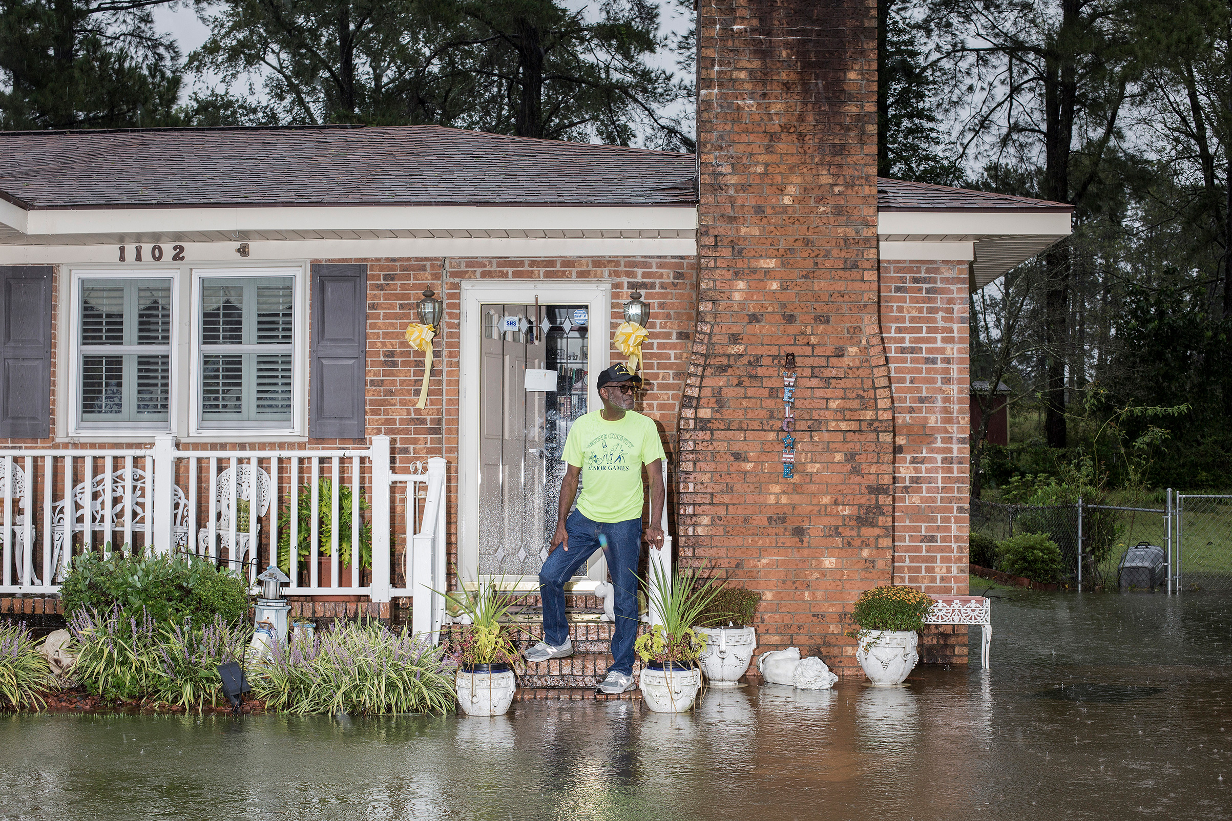Coy Coley in front of his home in Goldsboro, N.C., after his neighborhood was flooded due to rainfall from Hurricane Florence on Sept. 15. (Bryan Anselm—Redux for TIME)