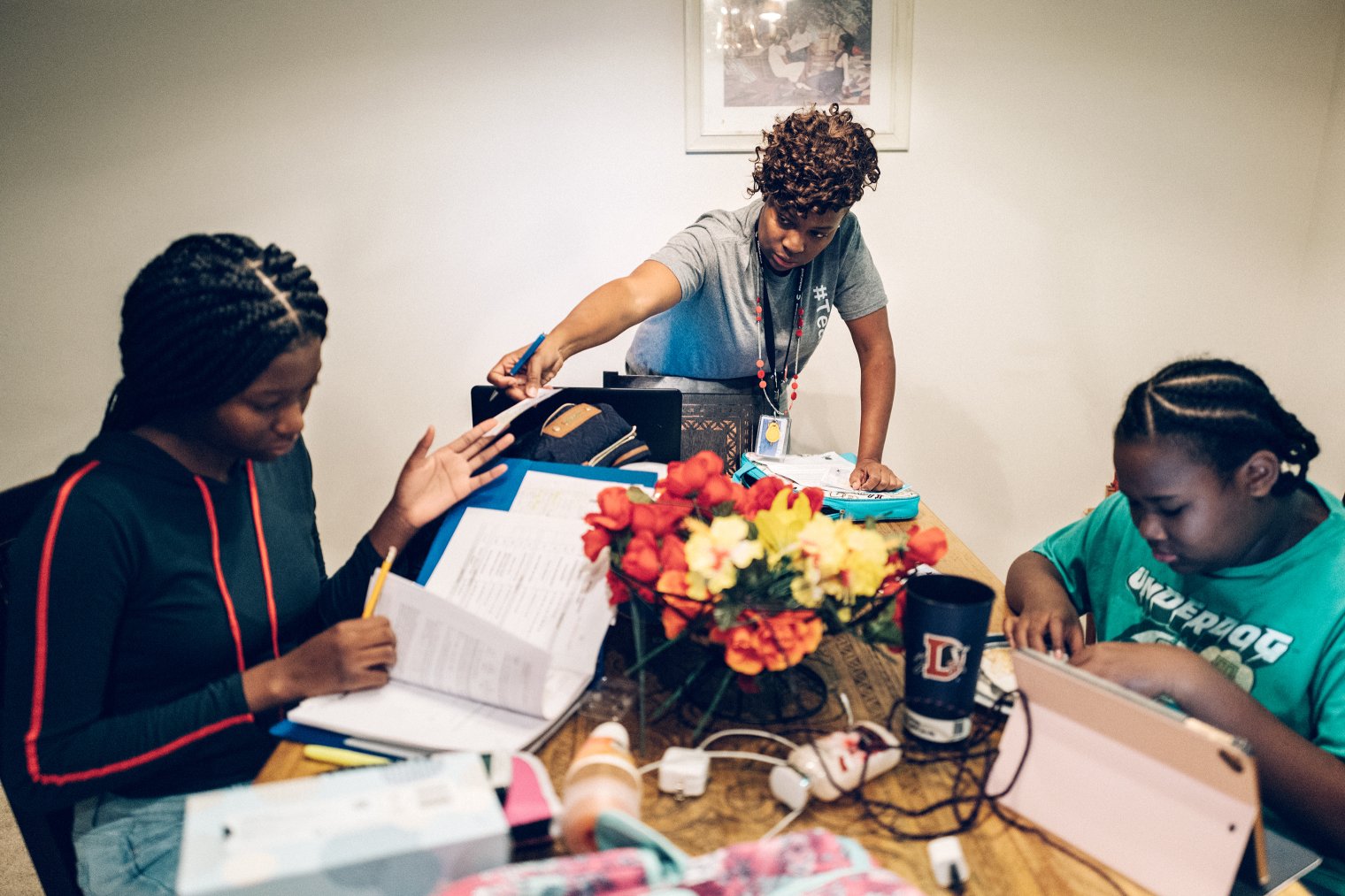 NaShonda Cooke, center, at home in the morning with her daughters in Raleigh, NC.