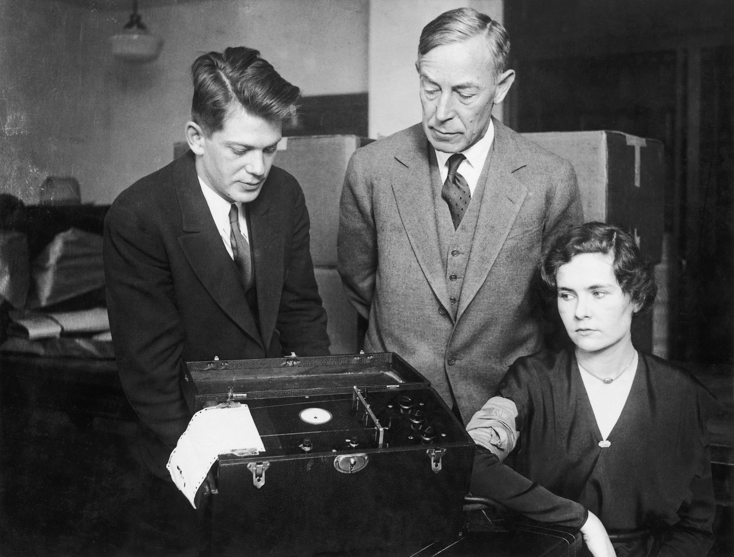 Leonarde Keeler (left) testing his polygraph machine on Marjorie Creighton in presence of August Vollmer during a trial in Chicago in 1932. (Keystone-France/Gamma-Keystone—Getty Images)