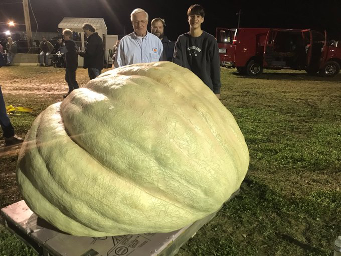 Steve Geddes shows off his record-breaking pumpkin (Photo Courtesy Henry Swenson)