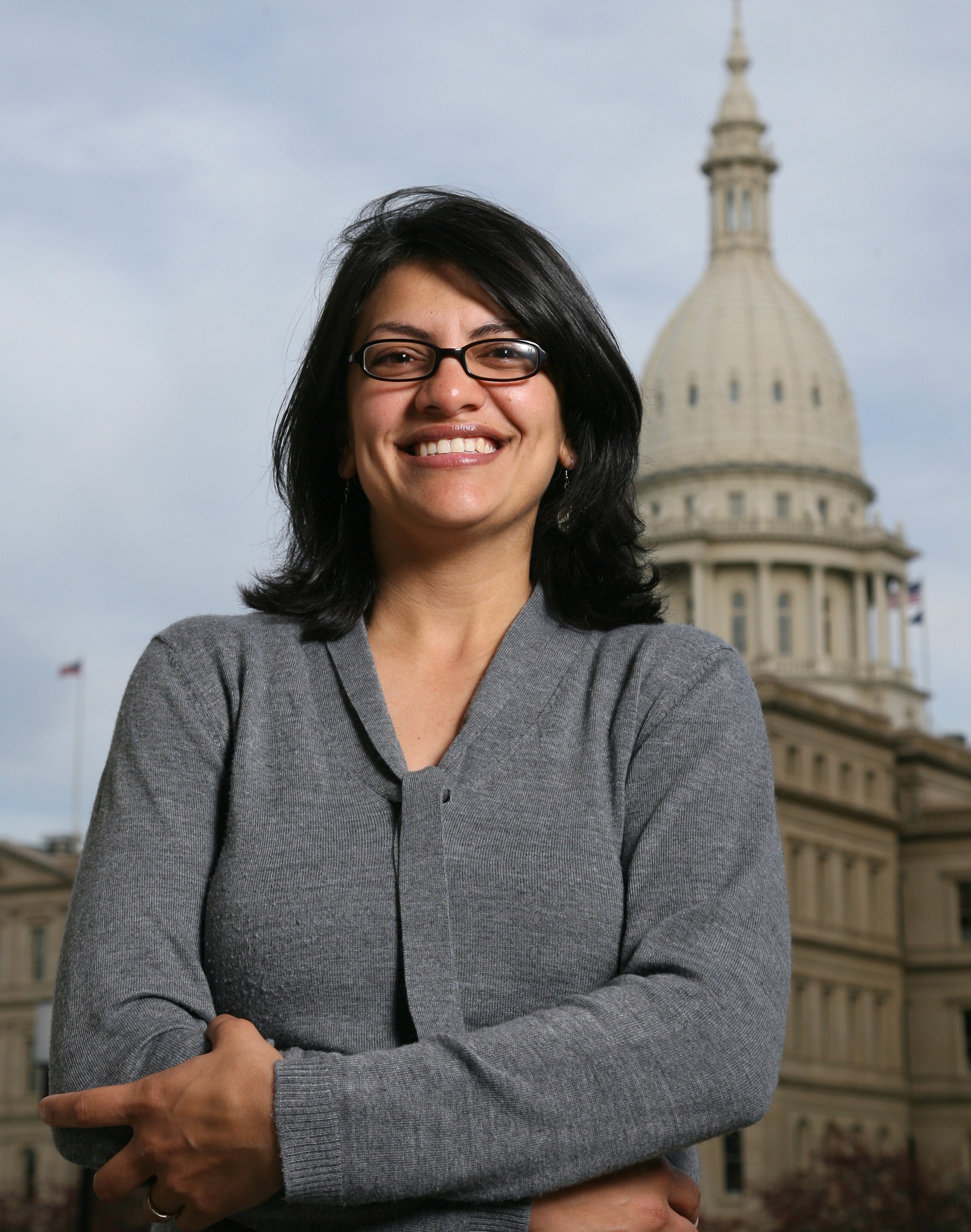 Rashida Tlaib is shown in front of the Michigan Capitol after her election as the first Muslim woman to serve in the state House. (Al Goldis—AP/Shutterstock)