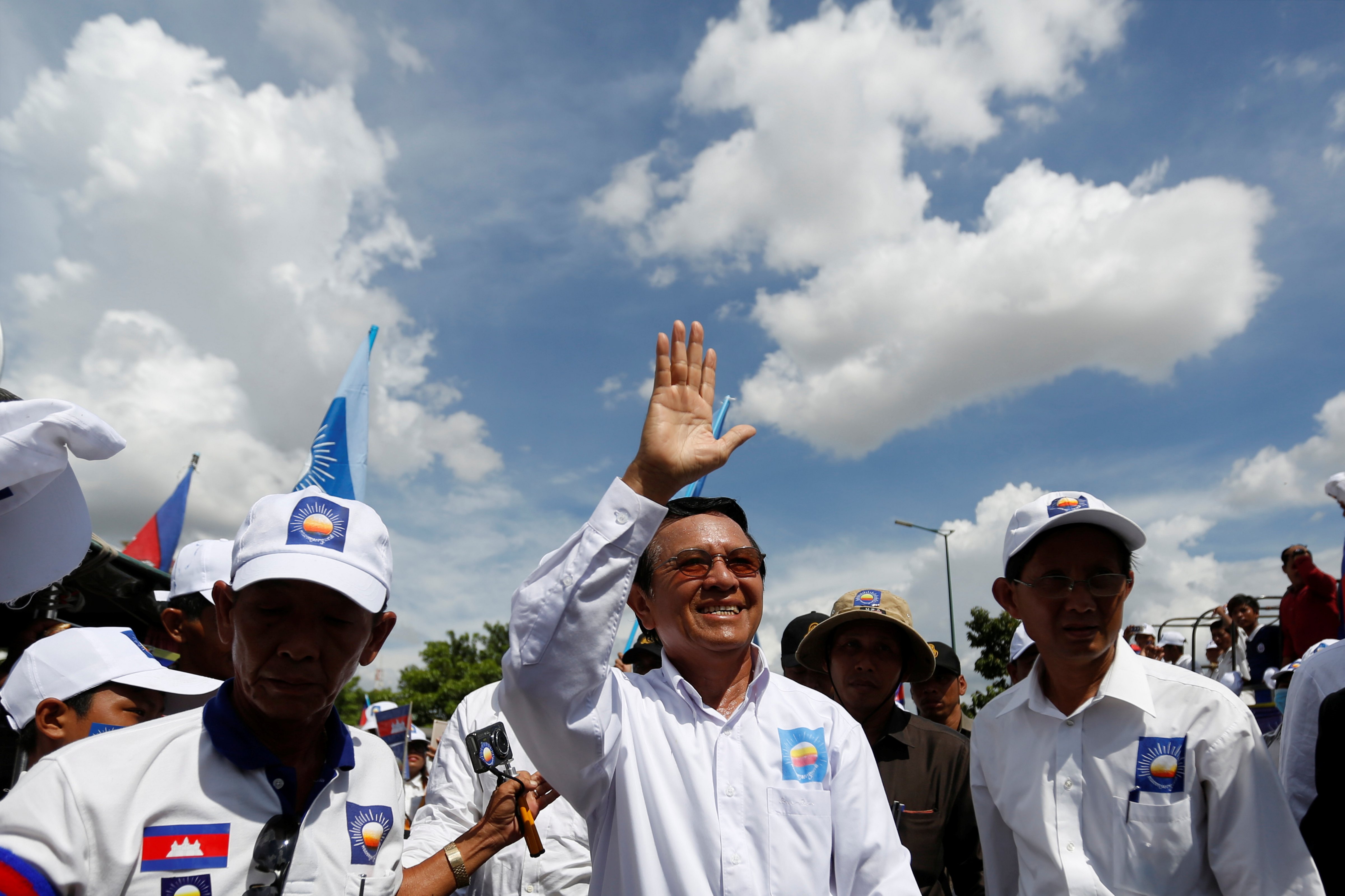 President of the opposition Cambodia National Rescue Party Kem Sokha arrives at a campaign rally in Phnom Penh