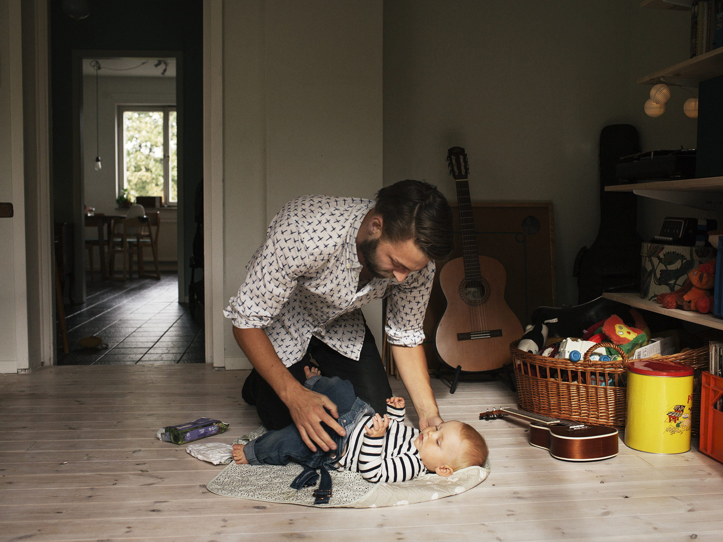 Martin Gunseus, 30, with 9-month-old son Pim, on Sept. 18 in Stockholm, two weeks into his scheduled eight-month paternity leave (Elin Berge—INSTITUTE for TIME)