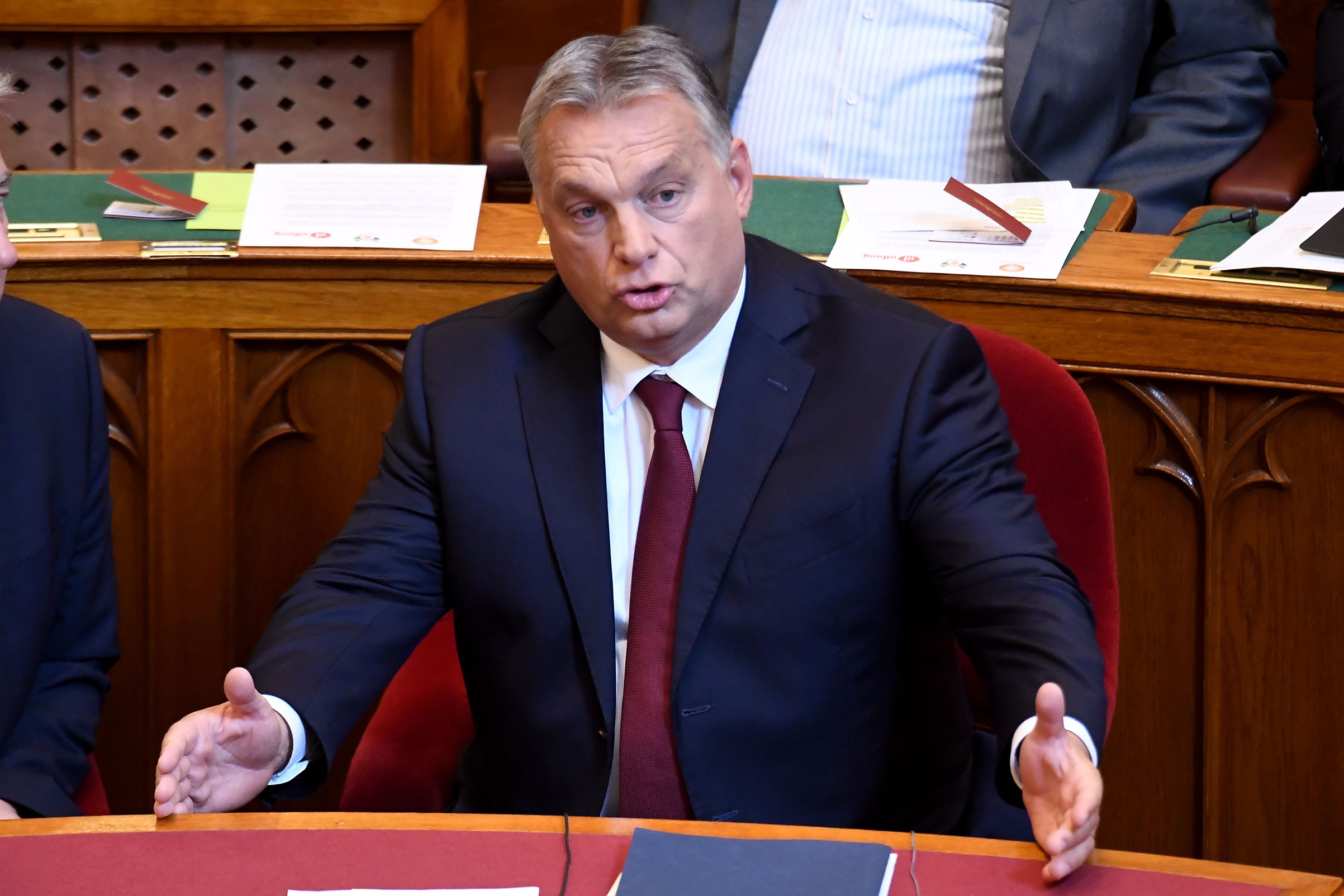 Prime Minister Viktor Orban speaks at the Hungarian parliament in Budapest on Sept. 17. (Attila Kisbenedek—AFP/Getty Images)