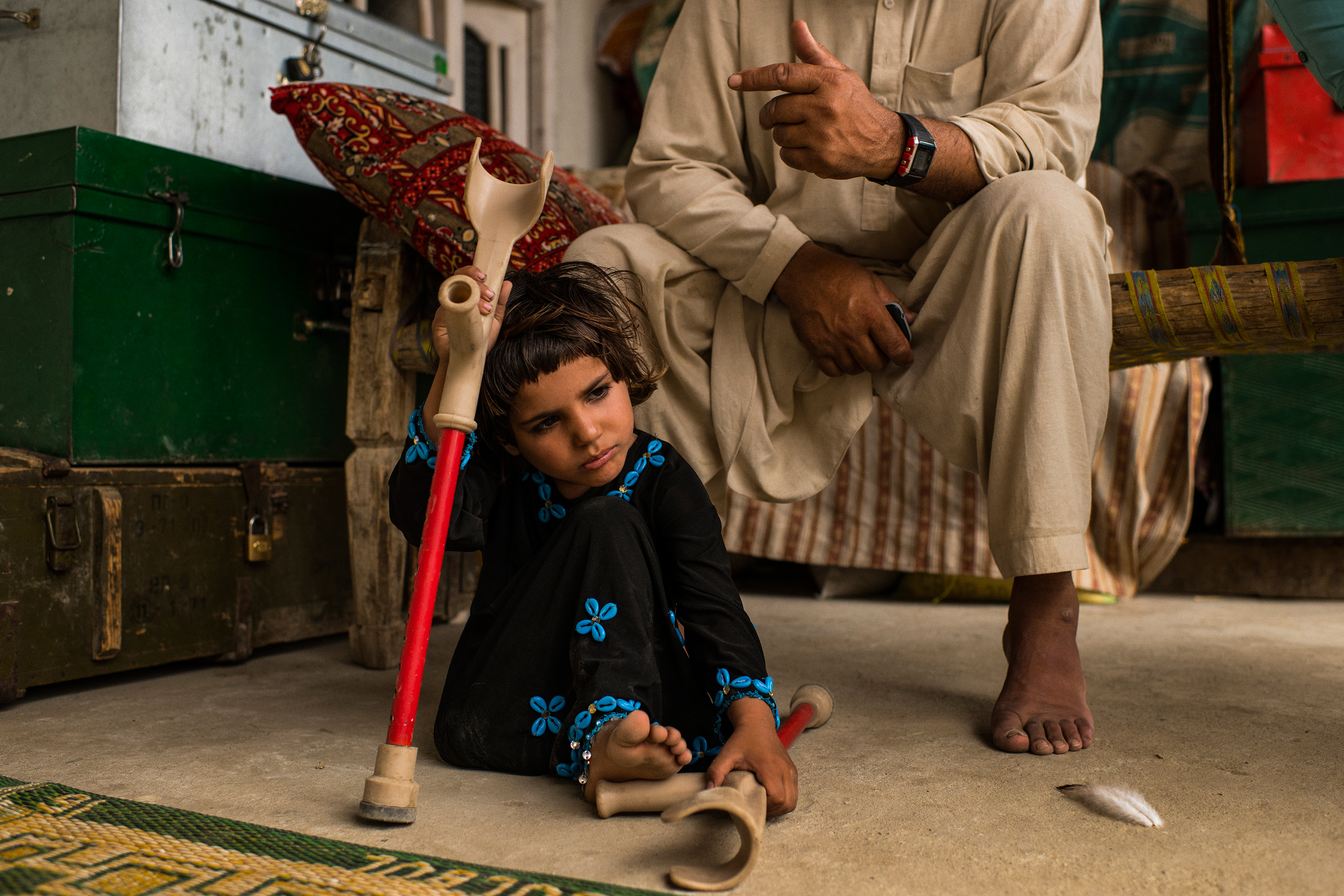 Marwa with her crutches in July. Her mother and twin sister were killed in the blast that led to the loss of part of her right leg. (Andrew Quilty for TIME)