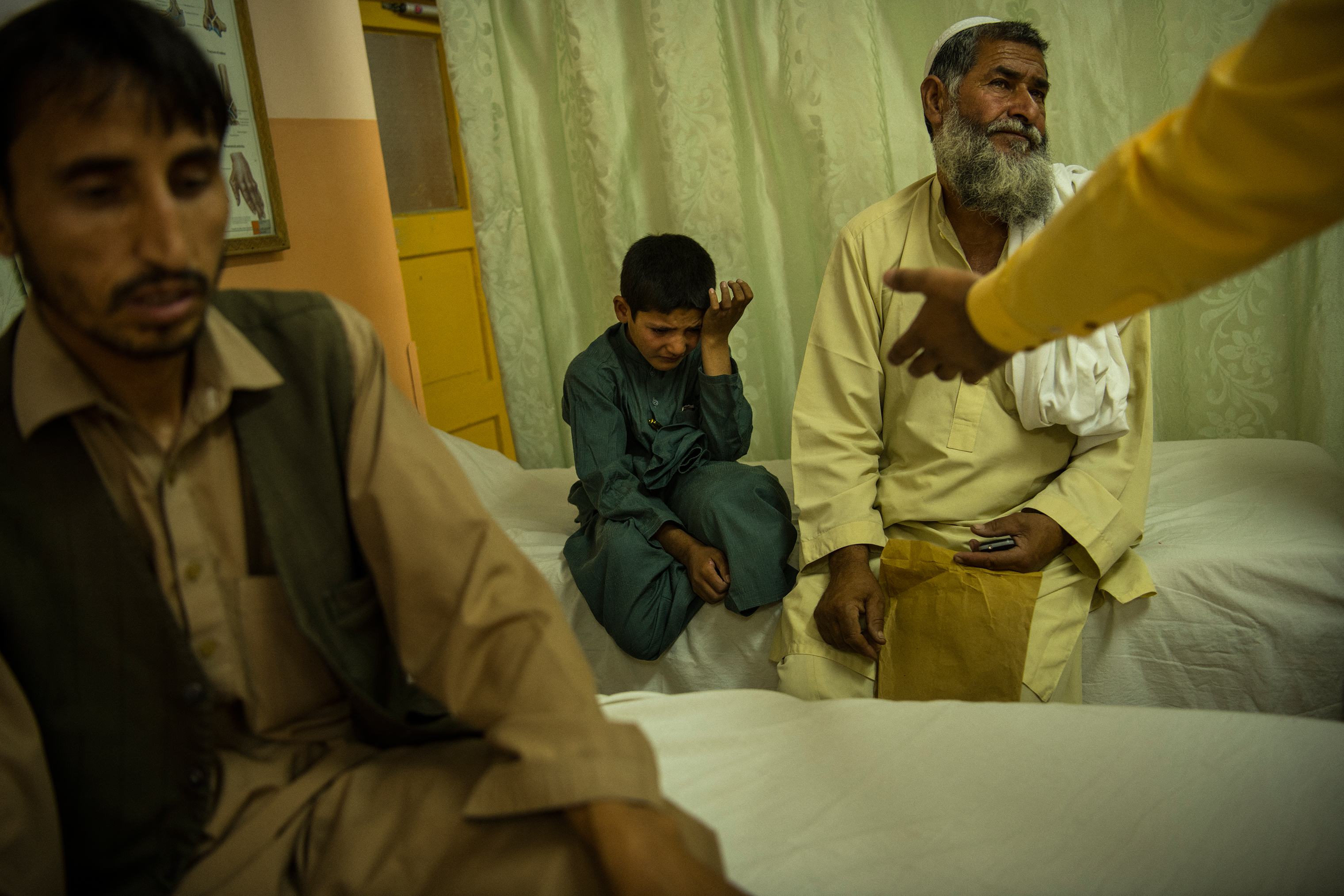 Abdul Rashid was assessed for surgery in late June after staffers at the orthopedic center performed an X-ray on his femurs and discovered that a severe fracture was far from healed. (Andrew Quilty for TIME)