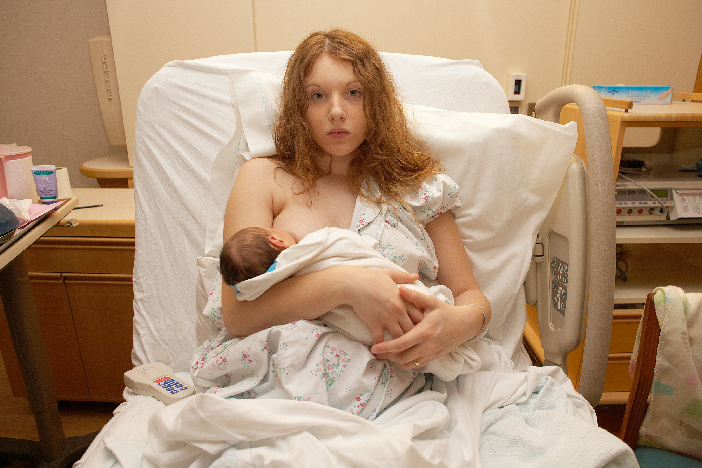 Dana Schubart 21, nursing KyLynne the day before she took her baby home in 2008," says Kenneally. (Brenda Ann Kenneally")