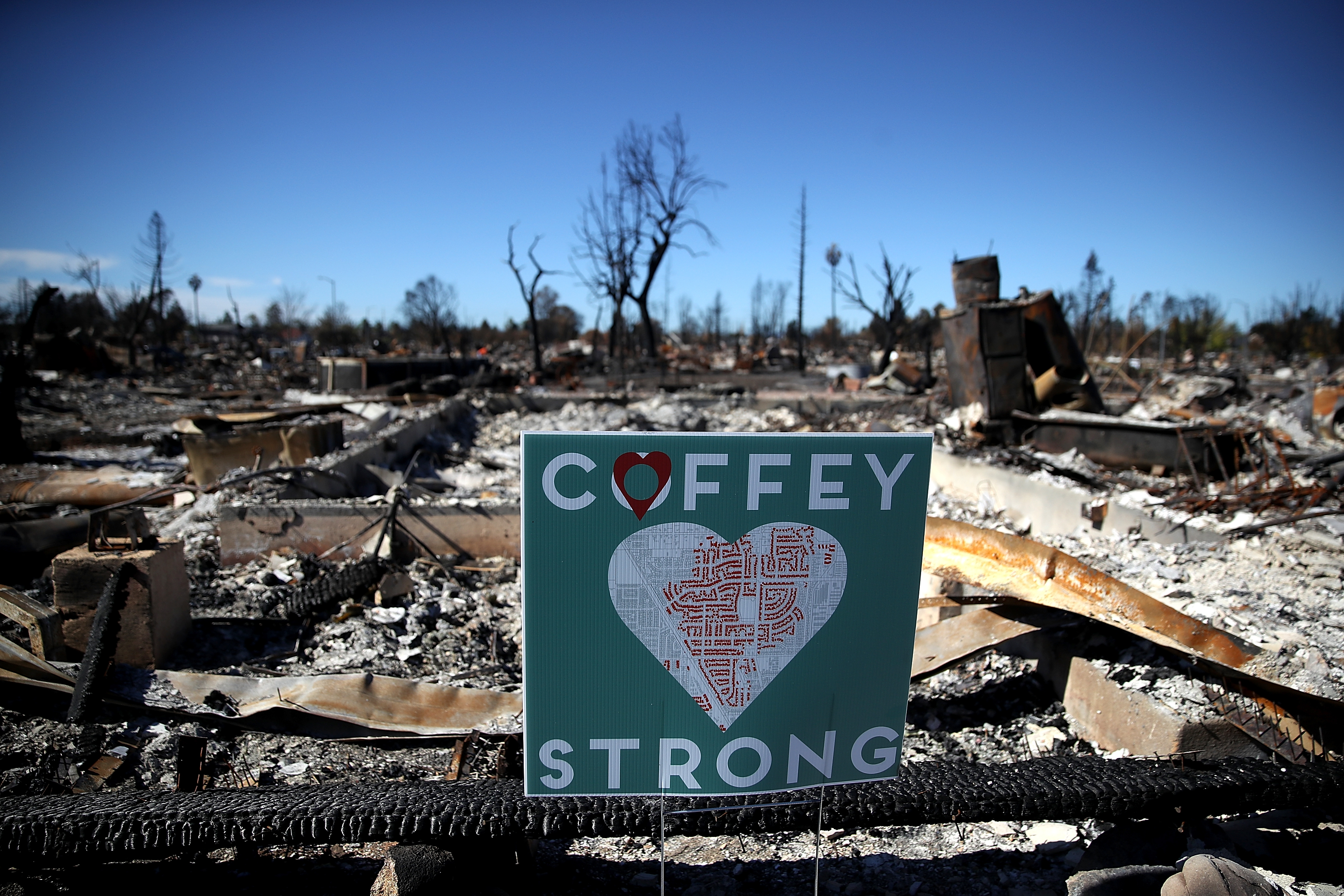 A sign is posted in front of a Coffey Park home that was destroyed by the Tubbs Fire on October 23, 2017 in Santa Rosa, California. (Justin Sullivan&mdash;Getty Images)