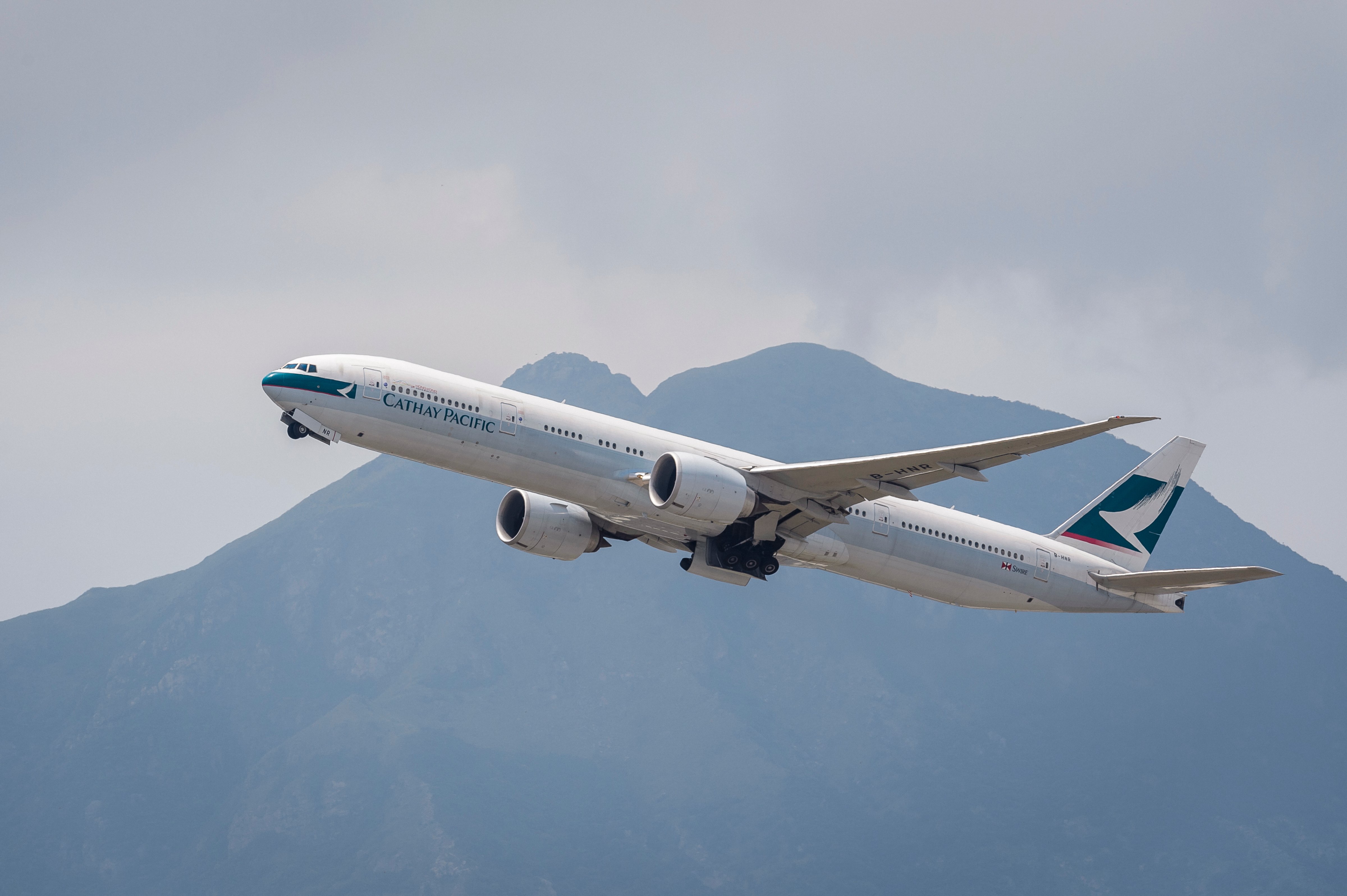 A Boeing 777-367(ER) passenger plane belonging to Cathay Pacific takes off from the Hong Kong International Airport in Hong Kong on Aug. 08 2018. (Marcio Rodrigo Machado—S3studio/Getty Images)