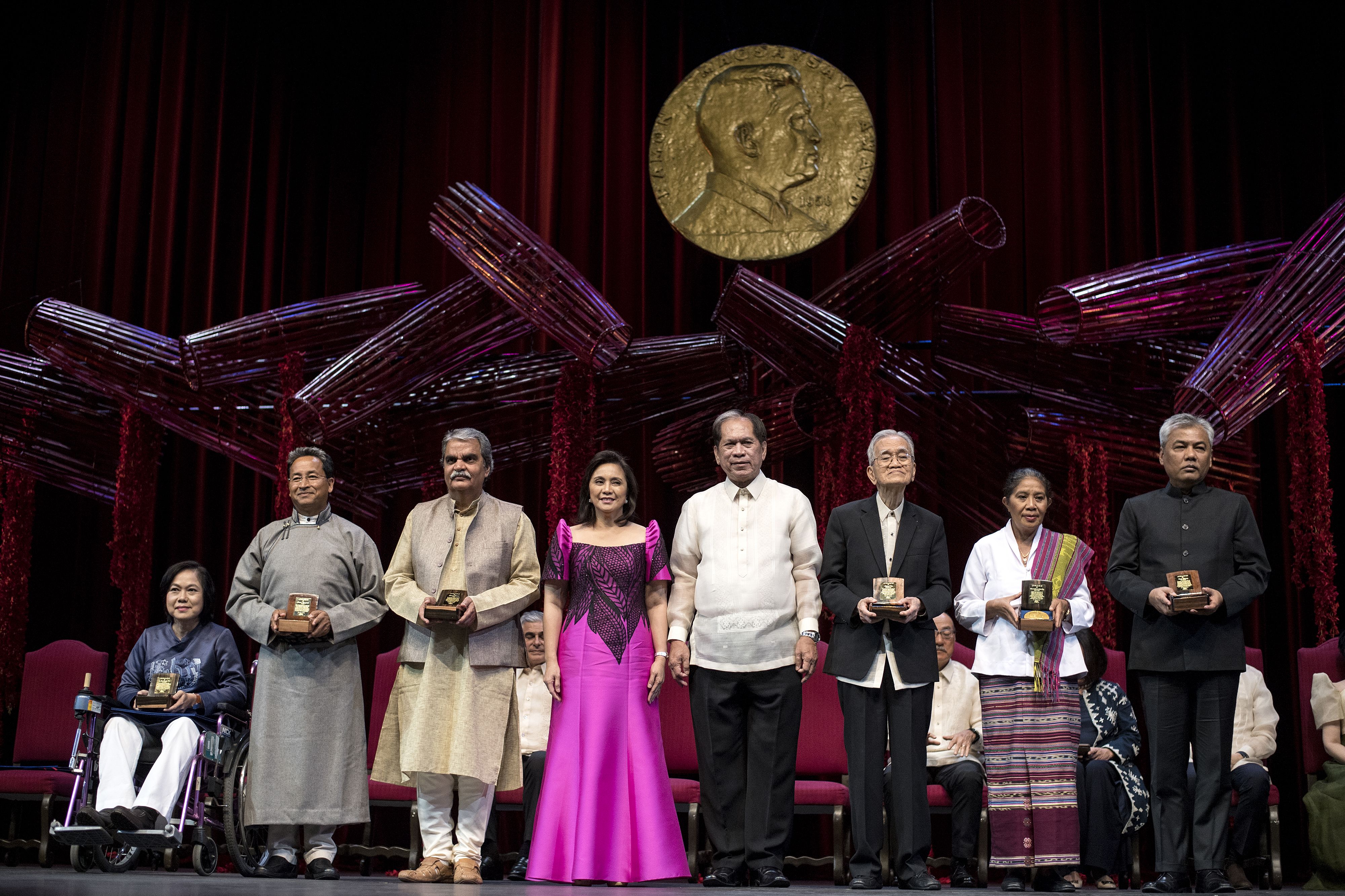 The 2018 Ramon Magsaysay Awardees, including, third form left, Bharat Vatwani of India, at the Cultural Center of the Philippines in Manila on August 31, 2018. (NOEL CELIS—AFP/Getty Images)
