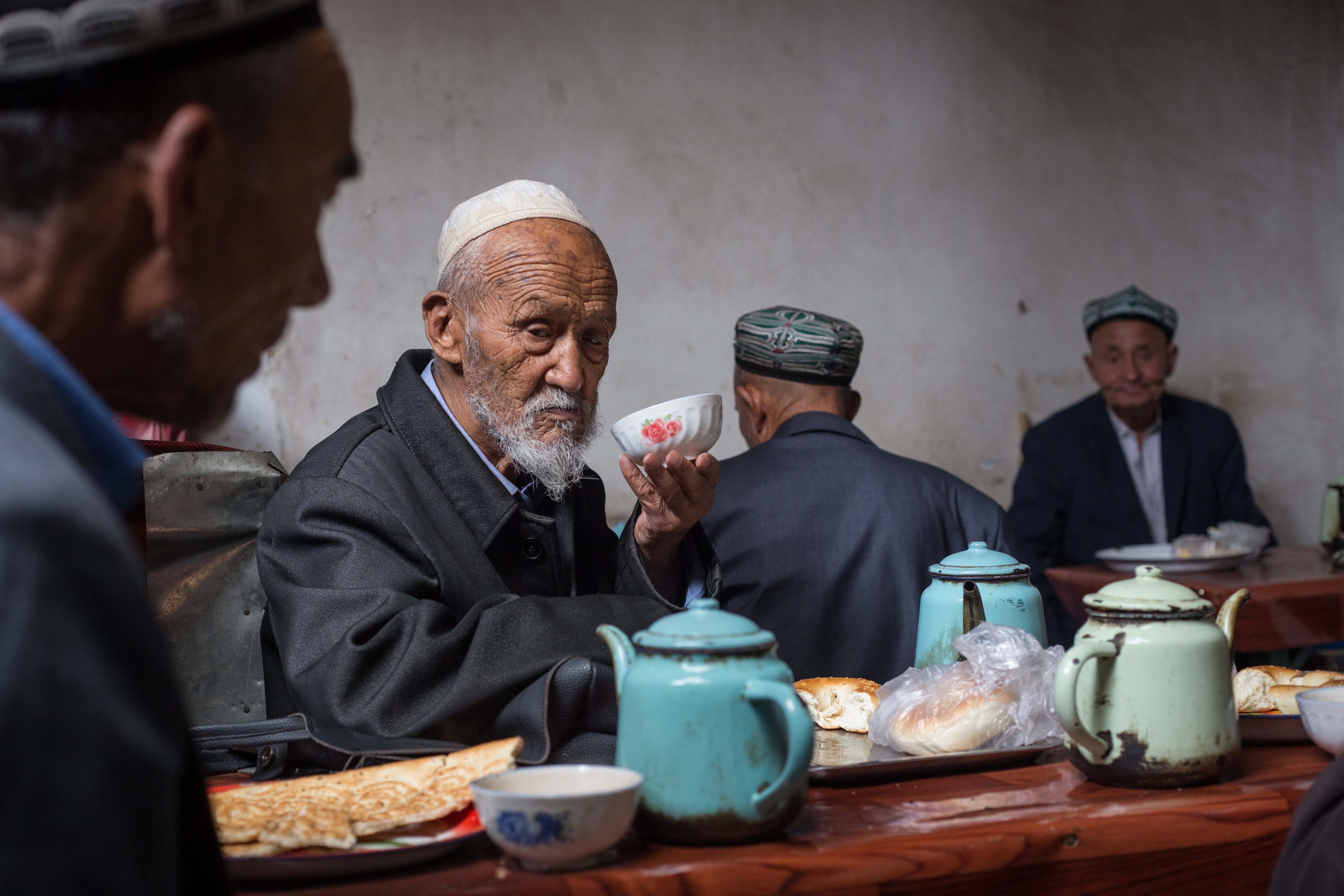 A Uighur man drinks tea at a local tea shop in Kashgar City, in China's Xinjiang Uyghur Autonomous Region on July 06, 2017. (Anadolu Agency/Getty Images)