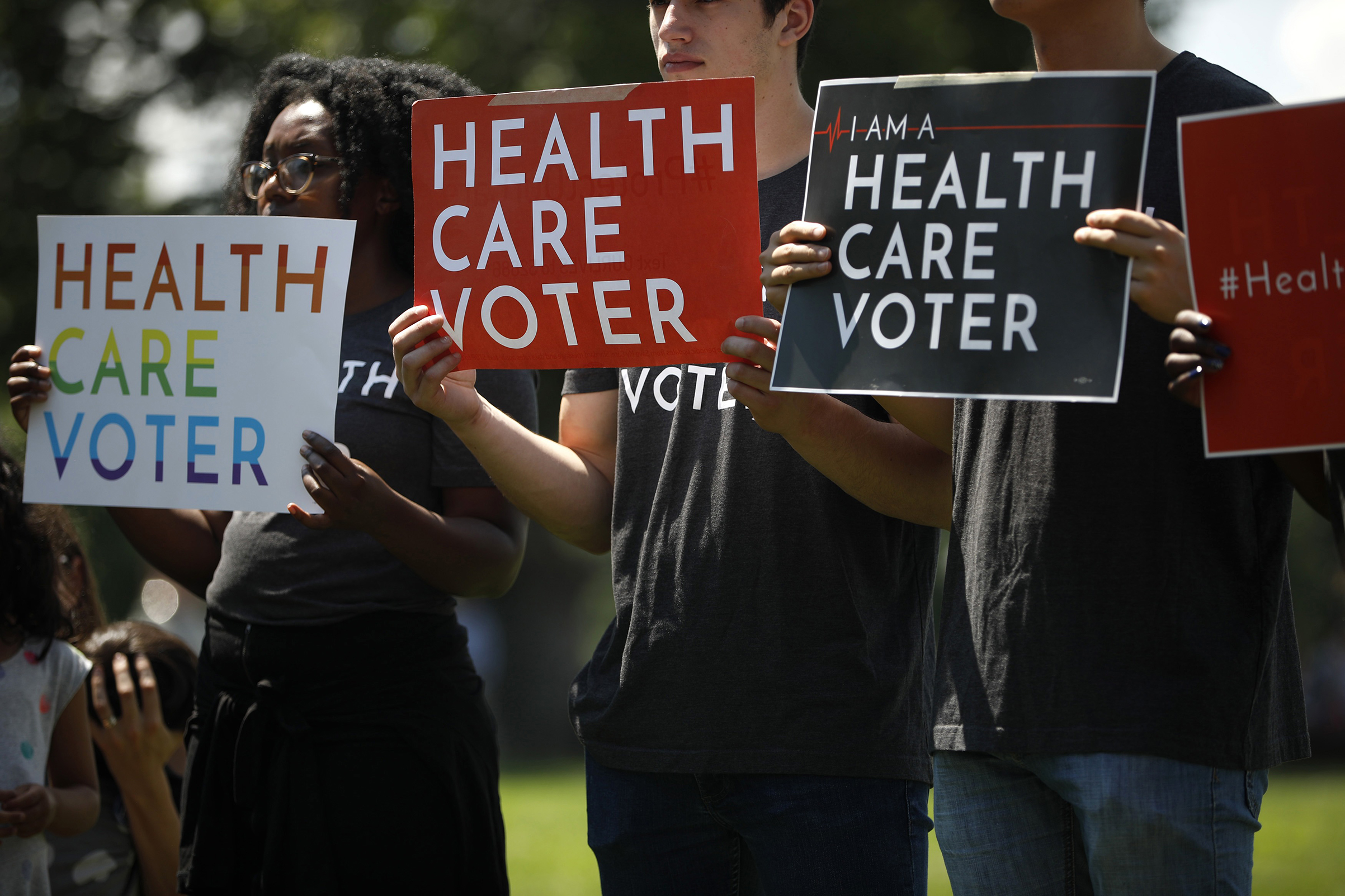 Protesters urged the Trump Administration to protect people with pre-existing conditions on June 26 in Washington, D.C. (Aaron P. Bernstein—Getty Images)