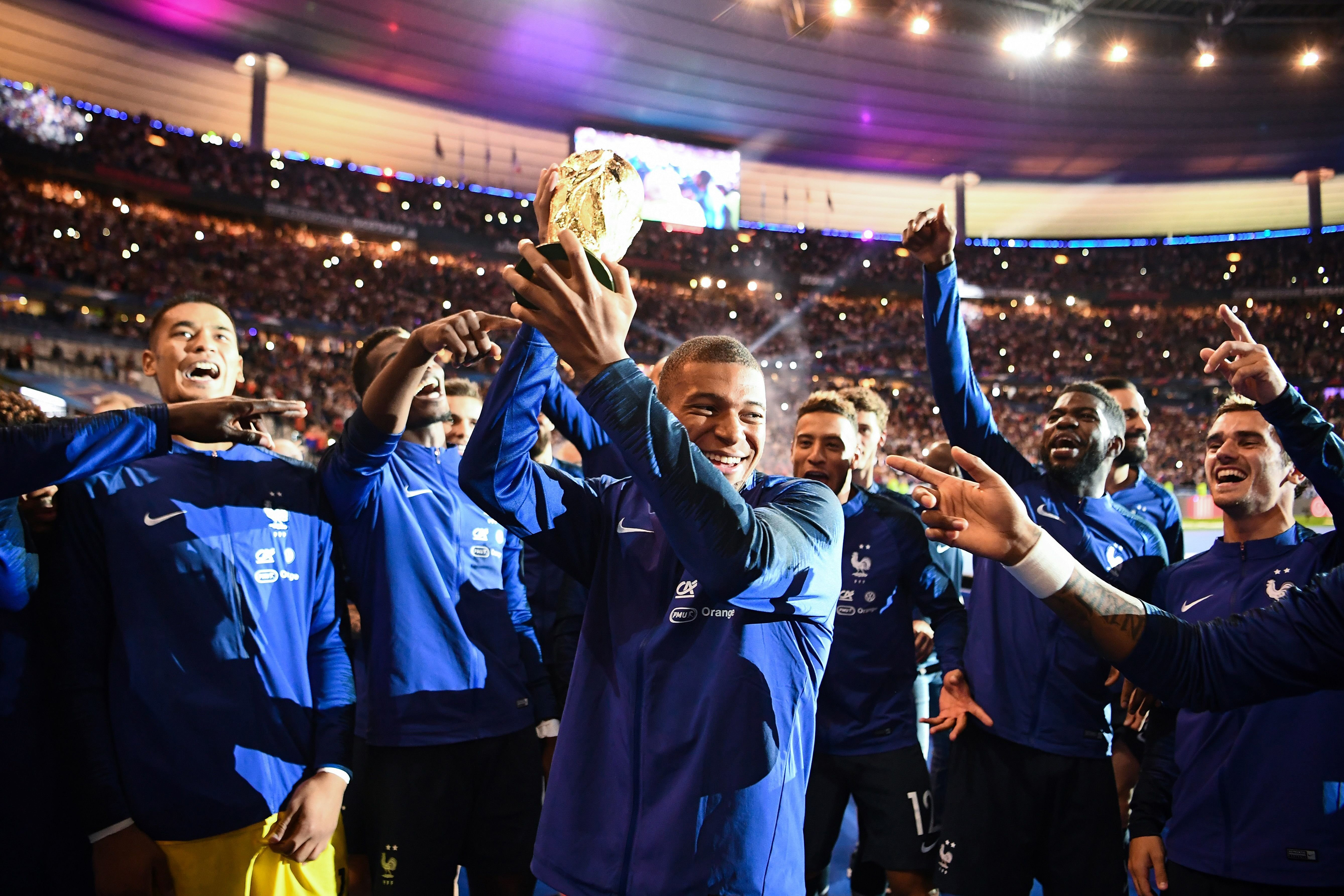 Mbappé during a September ceremony to celebrate France’s World Cup win. At 19, he became the country’s youngest goal scorer at a major tournament. (Sipa/AP Images)