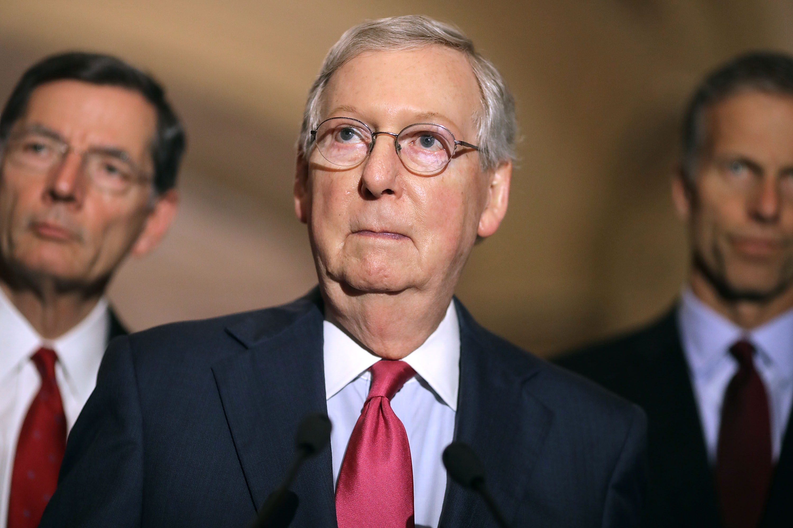 Senate Majority Leader Mitch McConnell (R-KY) talks to reporters with Sen. John Barrosso (R-WY) (L) and Sen. John Thune (R-SD) following their party's weekly policy luncheon at the U.S. Capitol May 16, 2017 in Washington, DC. (Getty Images)