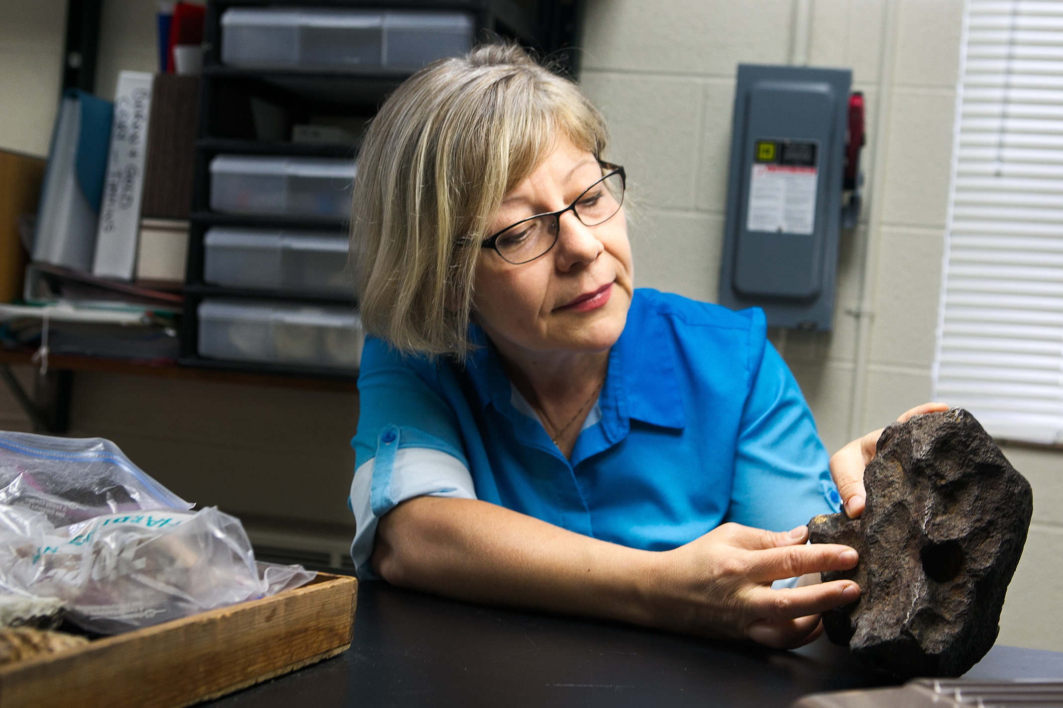 Central Michigan University Professor Mona Sirbescu shows off a meteorite