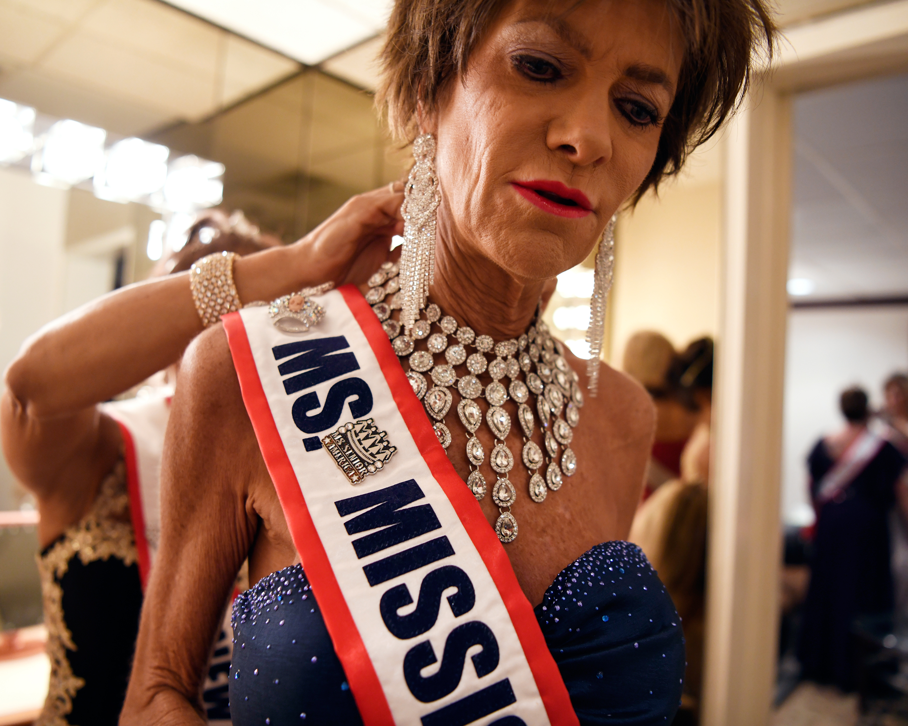 Mary Jane Lawler, Ms. Mississippi, gets ready before the Ms. Senior America Pageant finale. (Rosa Polin for TIME)