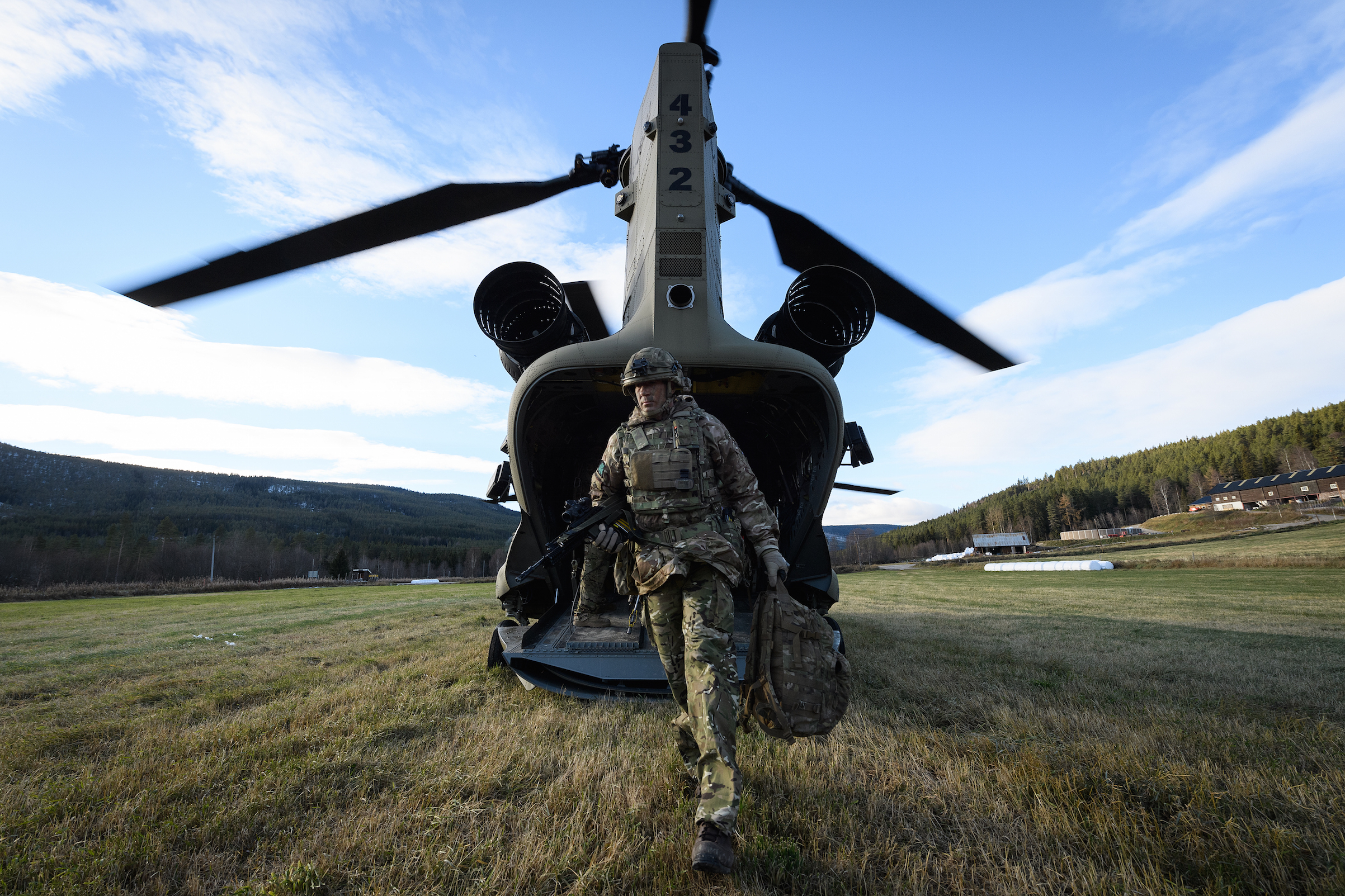 A British Army Brigade Commander disembarks from a United States Army Chinook CH-47 helicopter during a reconnaissance mission ahead of live exercise, on Oct. 27, 2018 in Alvdal, Norway. Over 40,000 participants from 31 nations will take part in the NATO "Trident Juncture" exercise, the largest exercise of it's kind to be held in Norway since the 1980s. (Leon Neal—Getty Images)