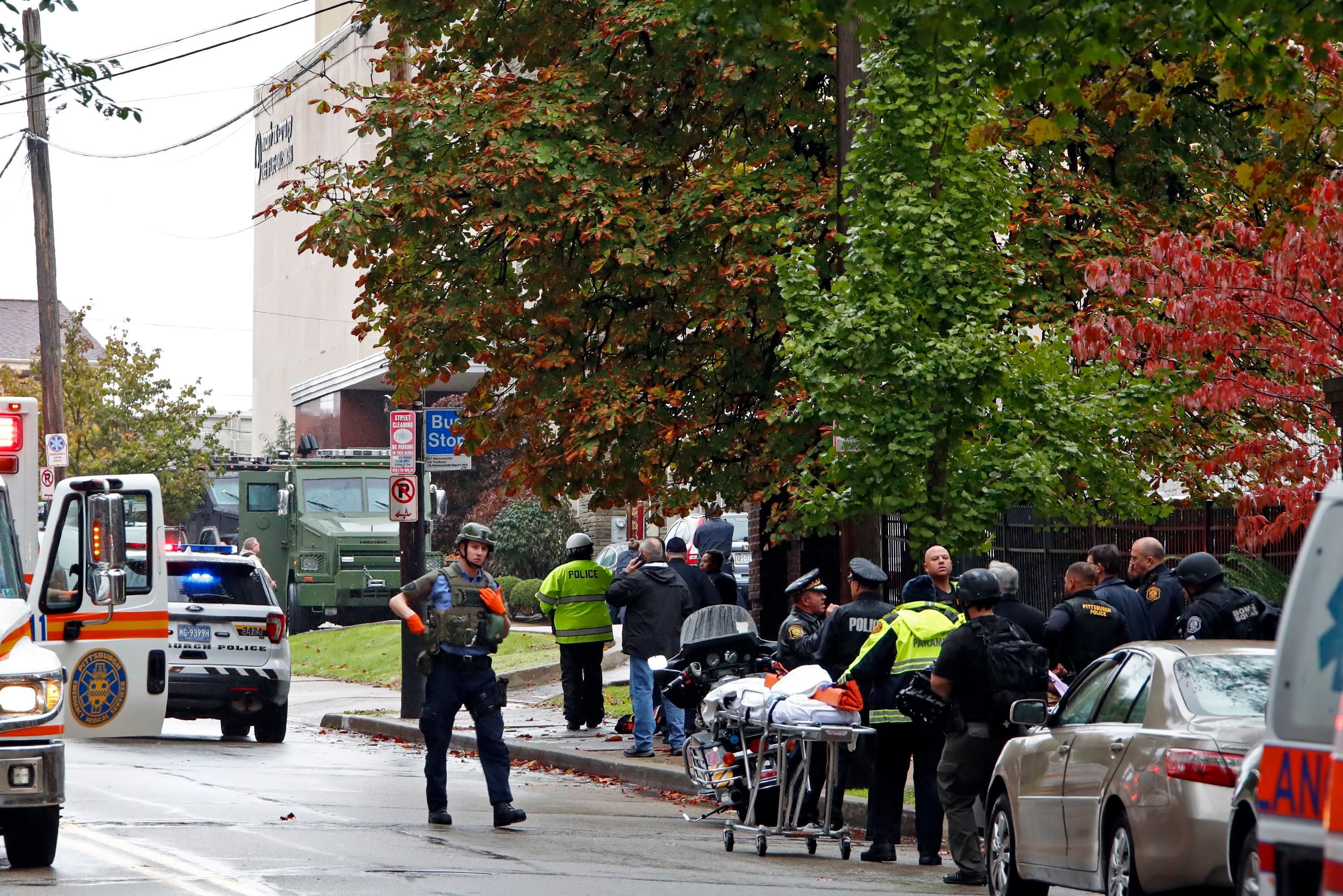 First responders surround the Tree of Life Synagogue where a shooter opened fire. (Gene J Puskar—AP/REX/Shutterstock)