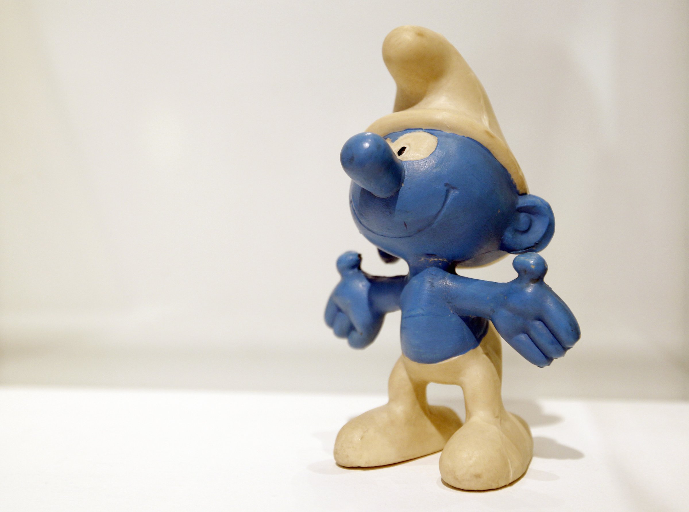 A Smurf (Schtroumpf in French) is displayed
