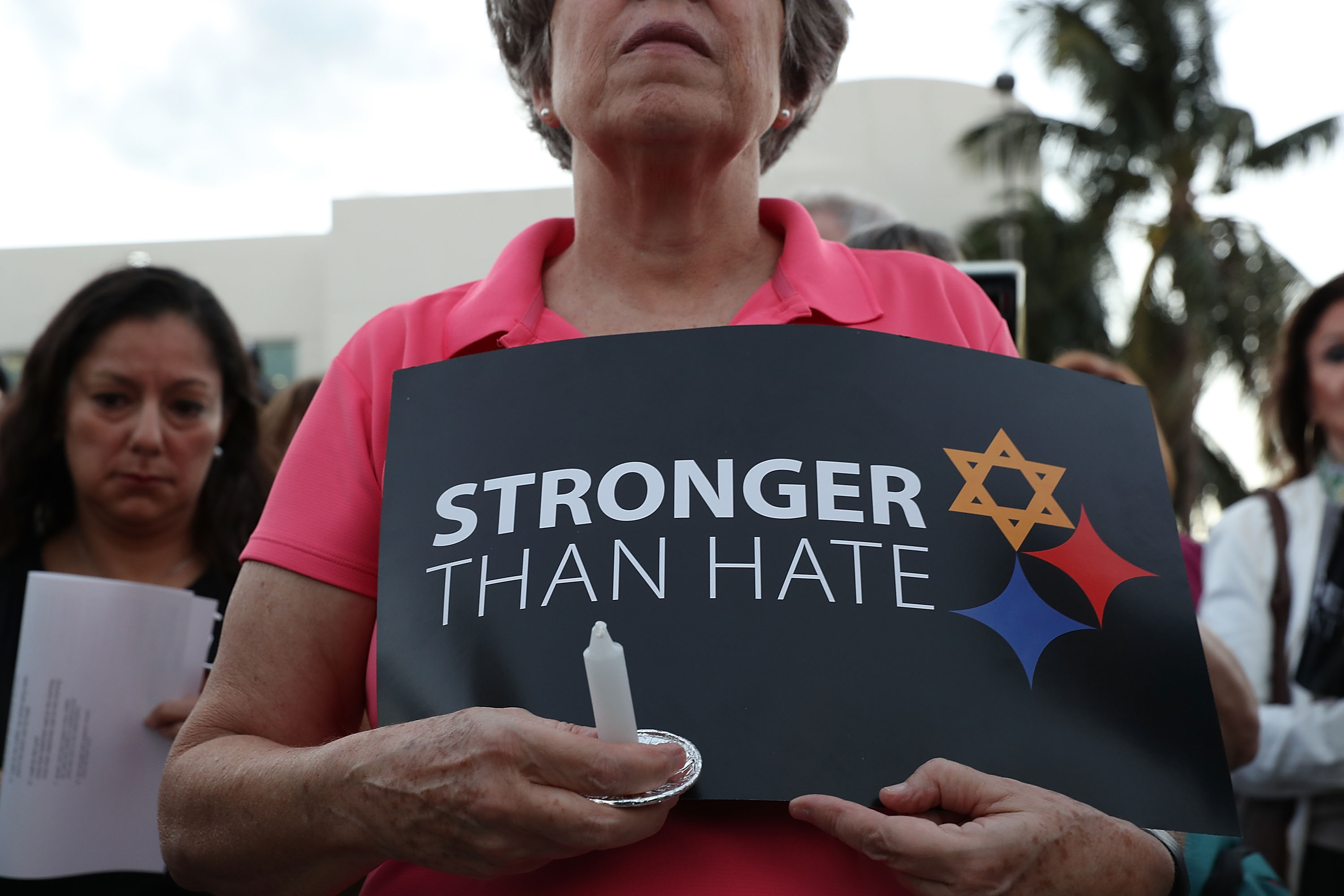A person holds a sign that reads, 'Stronger than Hate,' as she joins with others for a Community-Wide Solidarity Vigil at the Holocaust Memorial Miami Beach to remember the victims of the mass shooting at a Pittsburgh temple on October 30, 2018 in Miami Beach, Florida. (Joe Raedle&mdash;Getty Images)