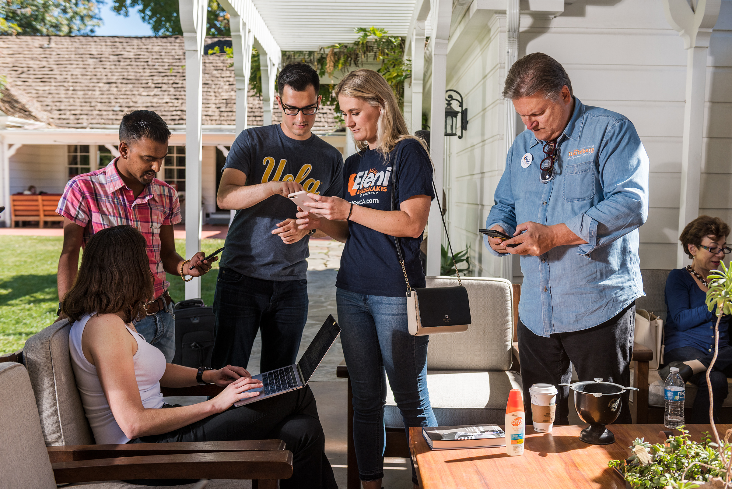 Volunteers attend a political "text bank" for California lieutenant governor candidate Eleni Kounalakis in Van Nuys, Calif., at the home of state Senator Robert Hertzberg on Oct. 20, 2018. (Damon Casarez for TIME)