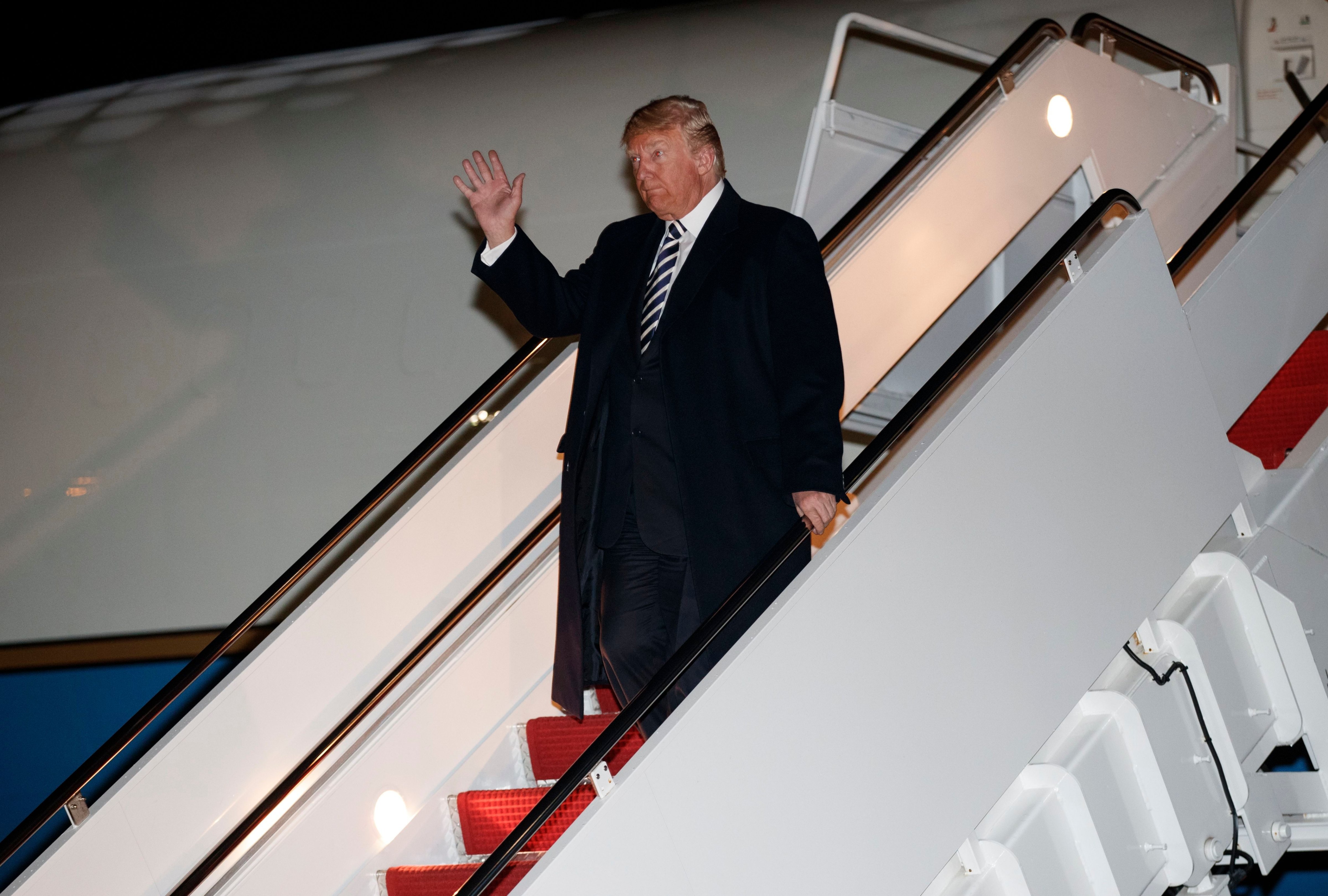 President Donald Trump disembarks from Air Force One, in Andrews Air Force Base, Md., on Oct. 20, 2018. (Carolyn Kaster—AP/REX/Shutterstock)