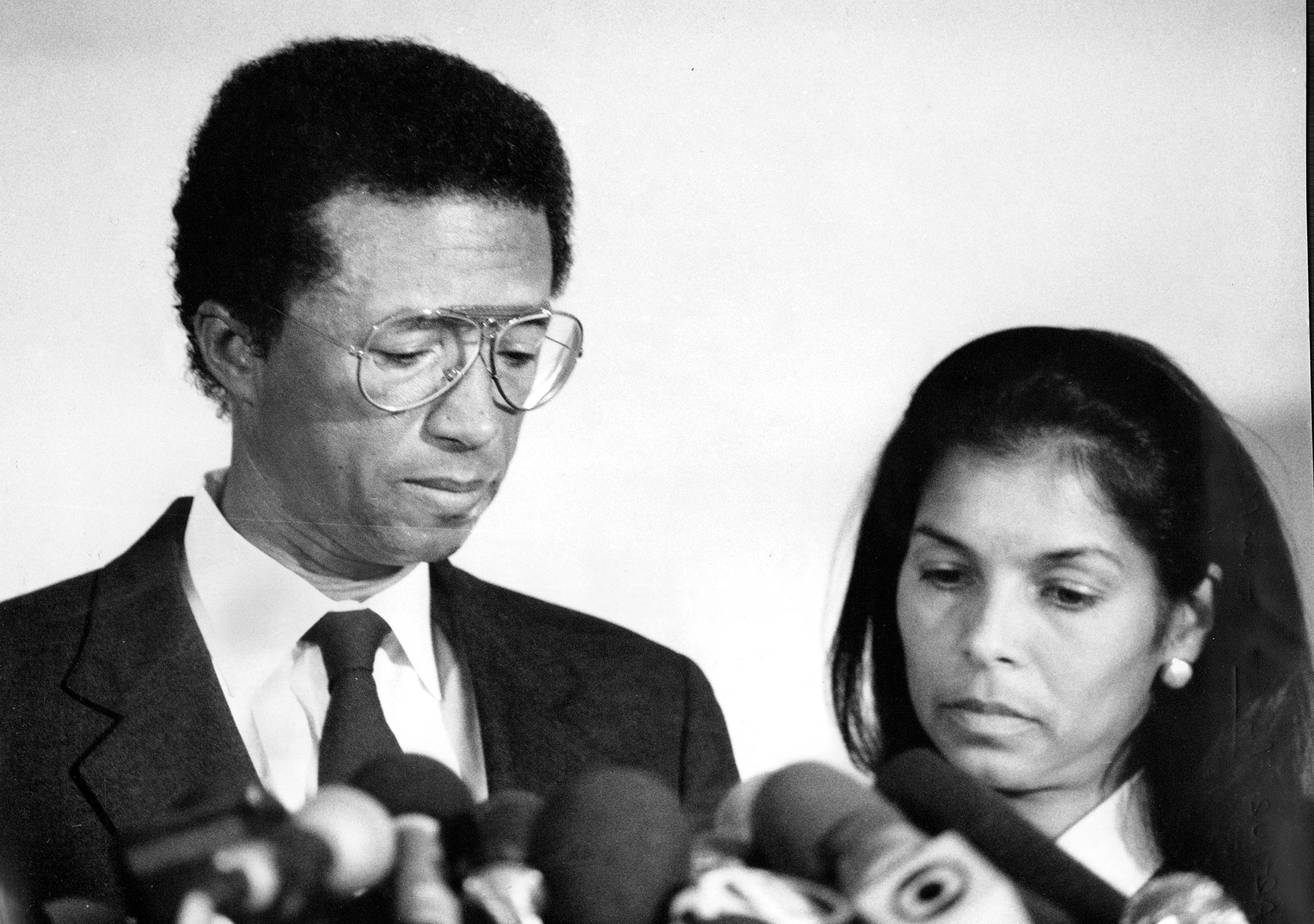 Tennis star Arthur Ashe, accompanied by wife Jeanne, announcing he contracted HIV after a blood transfusion on Apr. 8, 1992, in midtown Manhattan. (Michael Norcia/New York Post Archives—Getty Images)