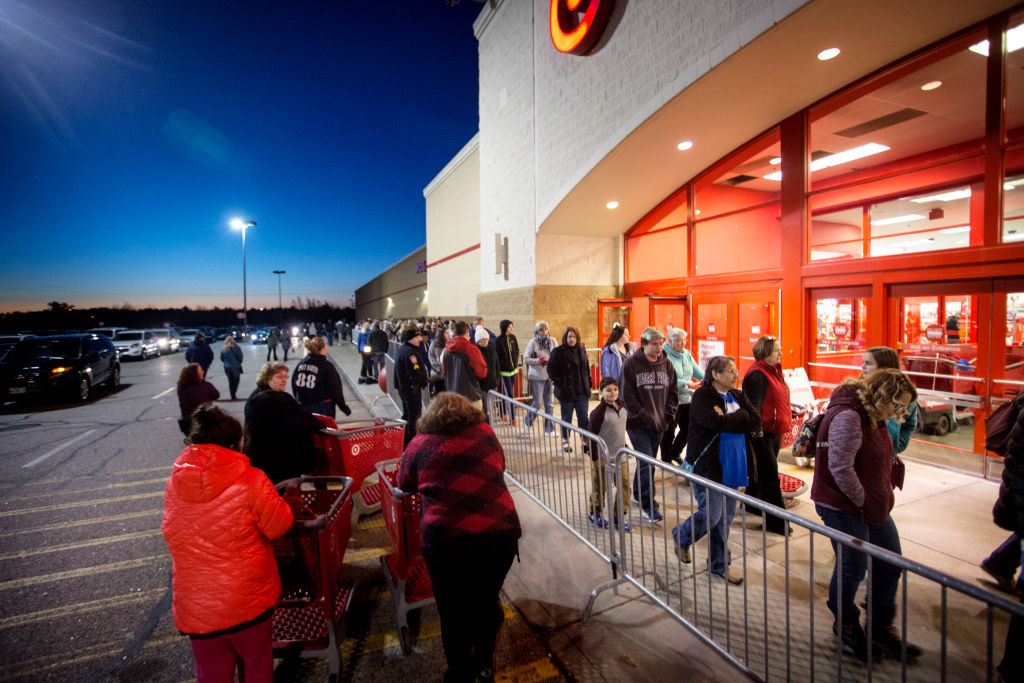 In this November 24, 2017 file photo, shoppers enter Target in South Portland, Maine, shortly after the store opened its doors on Friday morning. Target is one of many stores open on Thanksgiving Day this year. (Derek Davis—Portland Press Herald/Getty Images)