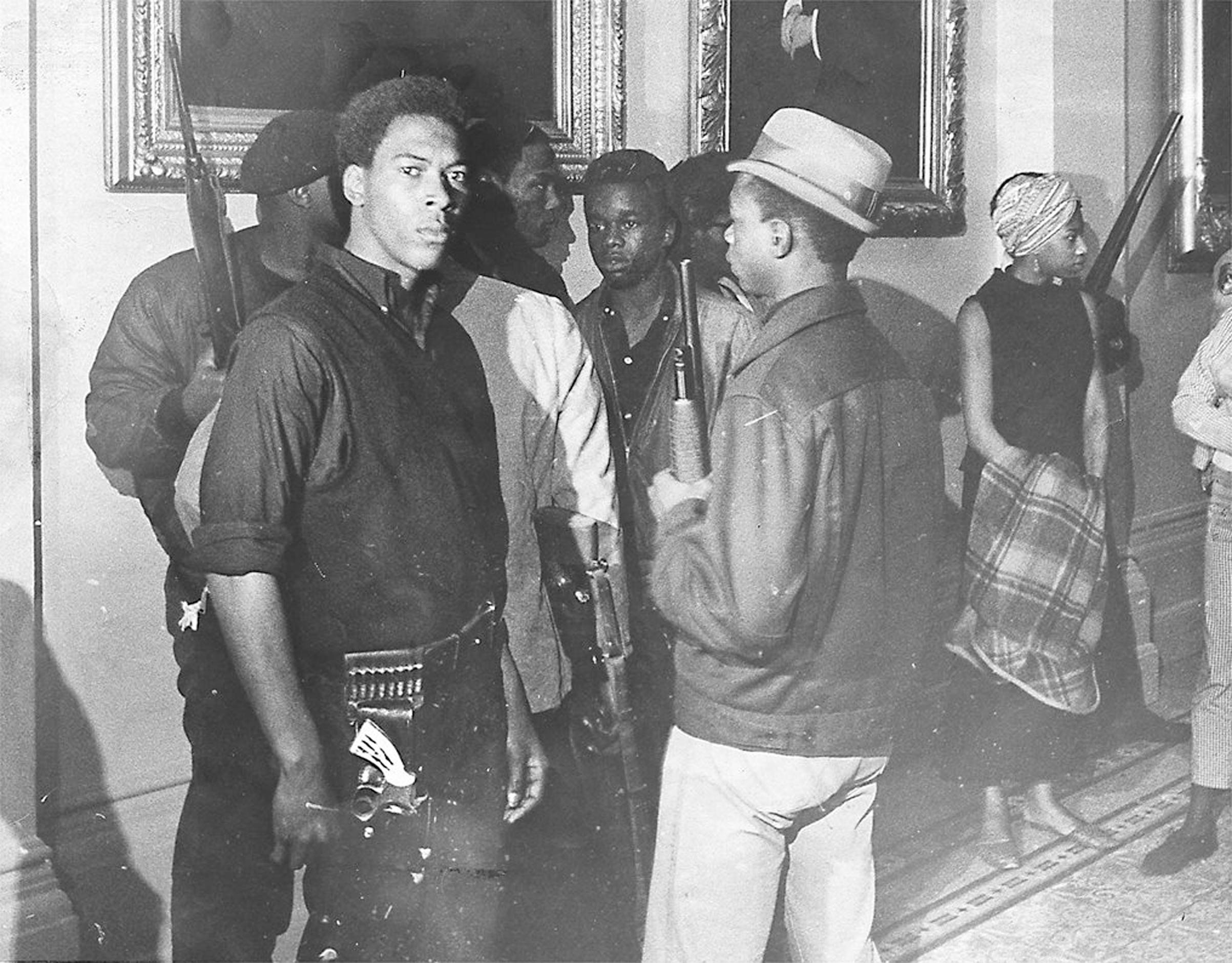 Members of the Black Panthers hold guns during the group's protest at the California Assembly in May 1967 in Sacramento, California. (Sacramento Bee/MCT—Getty Images)