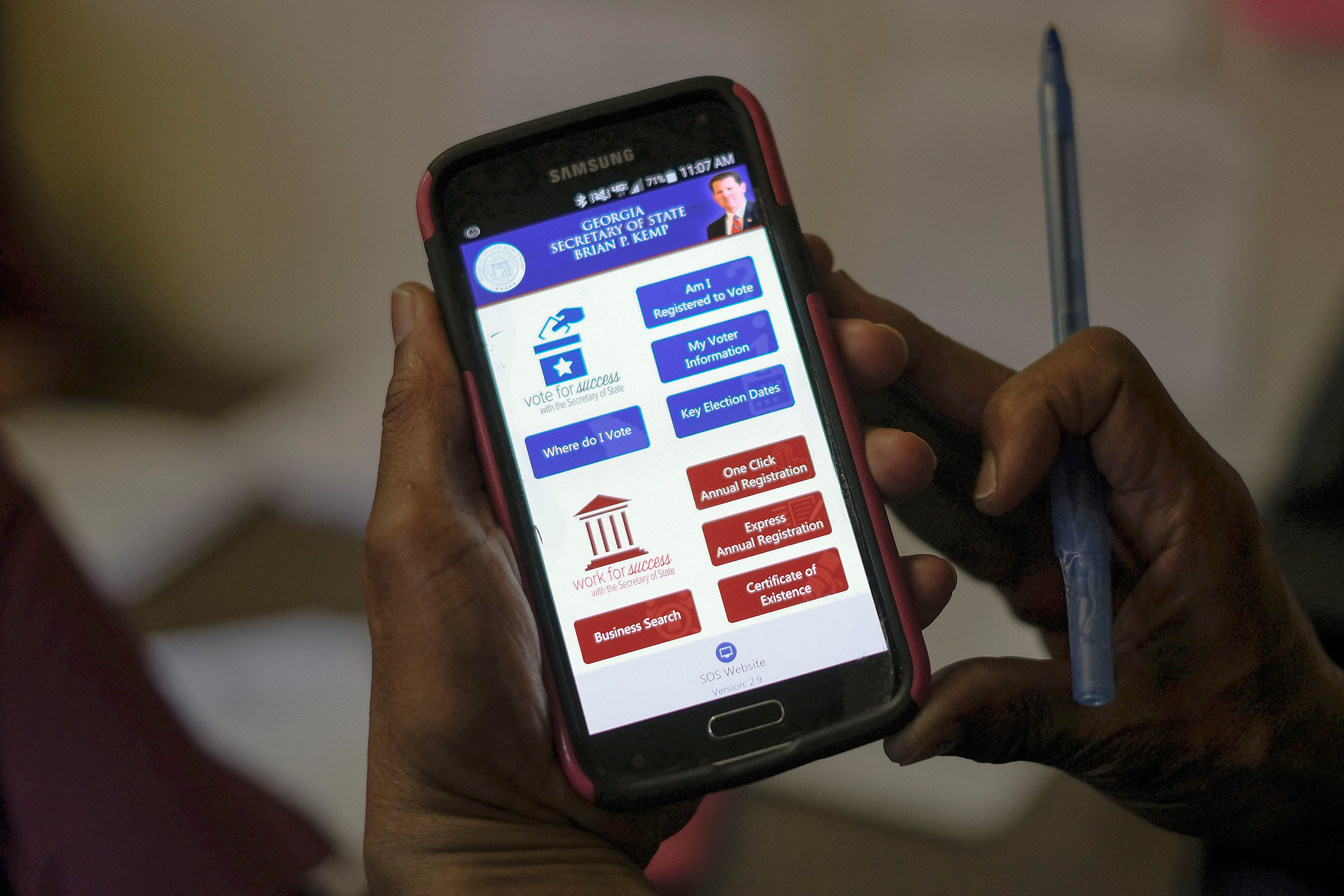 The Georgia SOS app is used by members of Women on the Move to confirm registration and polling precincts with callers at the Urban League of Greater Columbus in Columbus, Ga. on election day, Nov. 6, 2018. (Gabriella Demczuk for TIME)