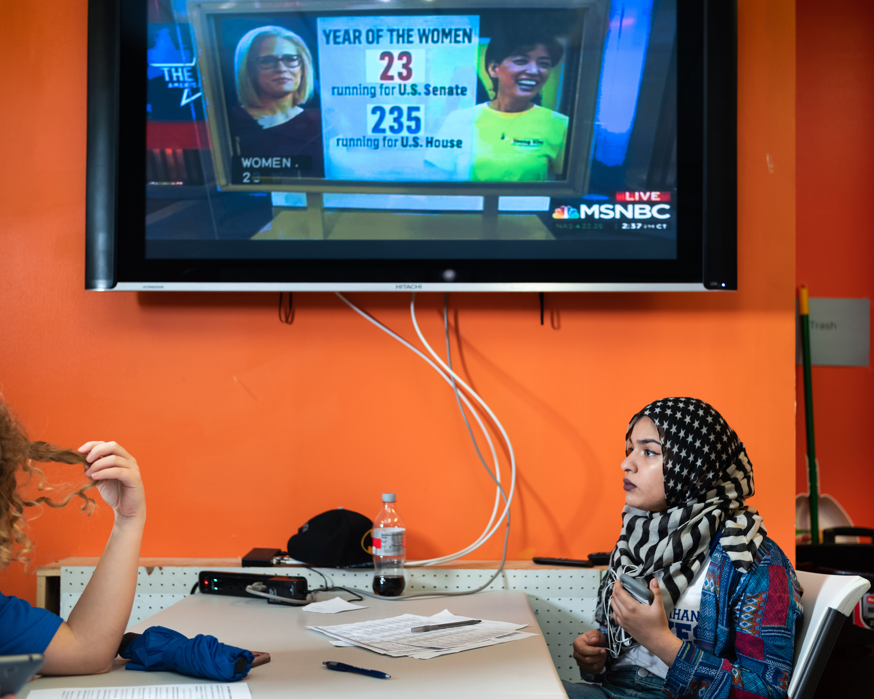 Volunteer Fizza Alam calls voters on Election Day at the Campaign Headquarters for Jahana Hayes. Hayes is poised to be the first African American Woman from New England voted to the US Congress . (Greg Miller for TIME)