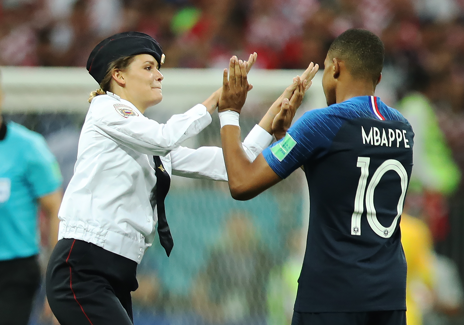 Anti-Kremlin Russian protest group Pussy Riot has taken responsibility for the pitch invasion at the 2018 FIFA World Cup Russia Final between France and Croatia at Luzhniki Stadium on July 15, 2018 in Moscow. (Ian MacNicol—Getty Images)