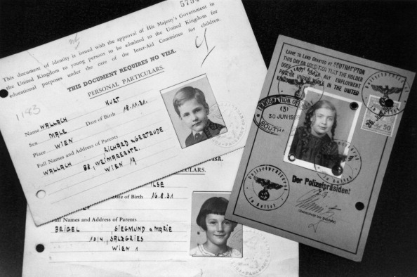 Kindertransport documents, c1939. They show photographs and details for three children who were brought to Britain from Austria to escape the Nazis. (Heritage Images—Heritage Images/Getty Images)